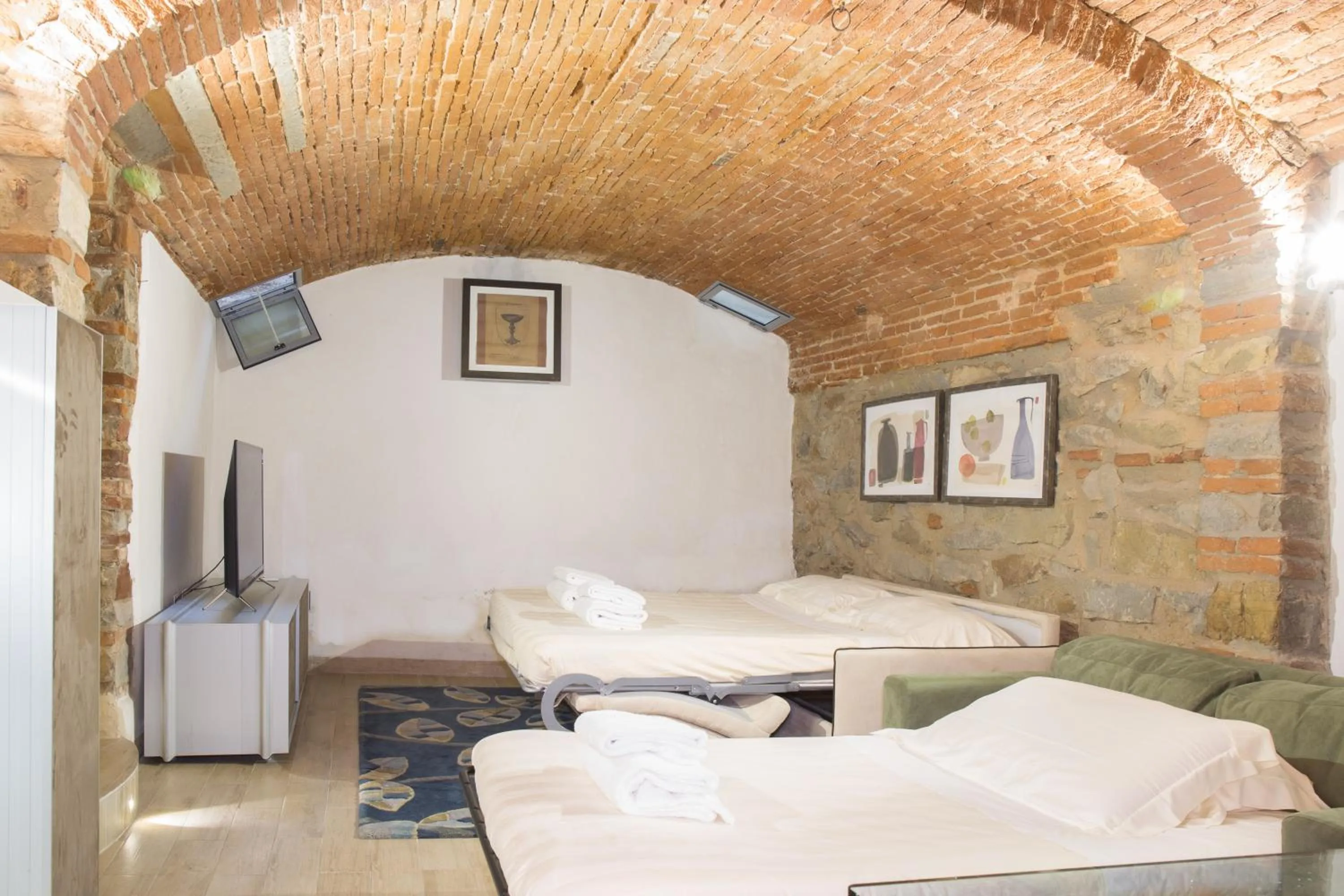 Bed in Giglio Apartments by Mmega