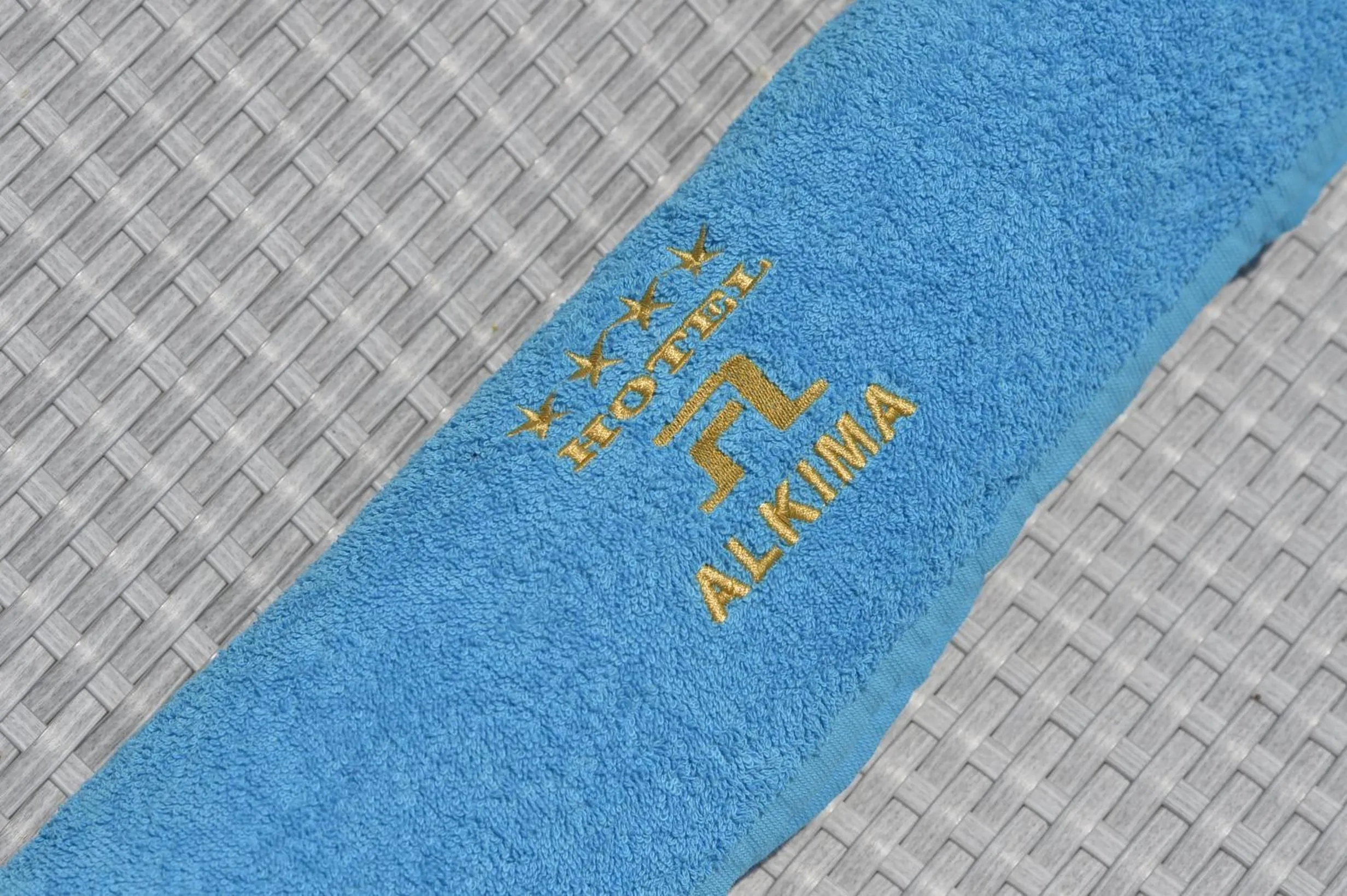 Property logo or sign in Hotel Alkima