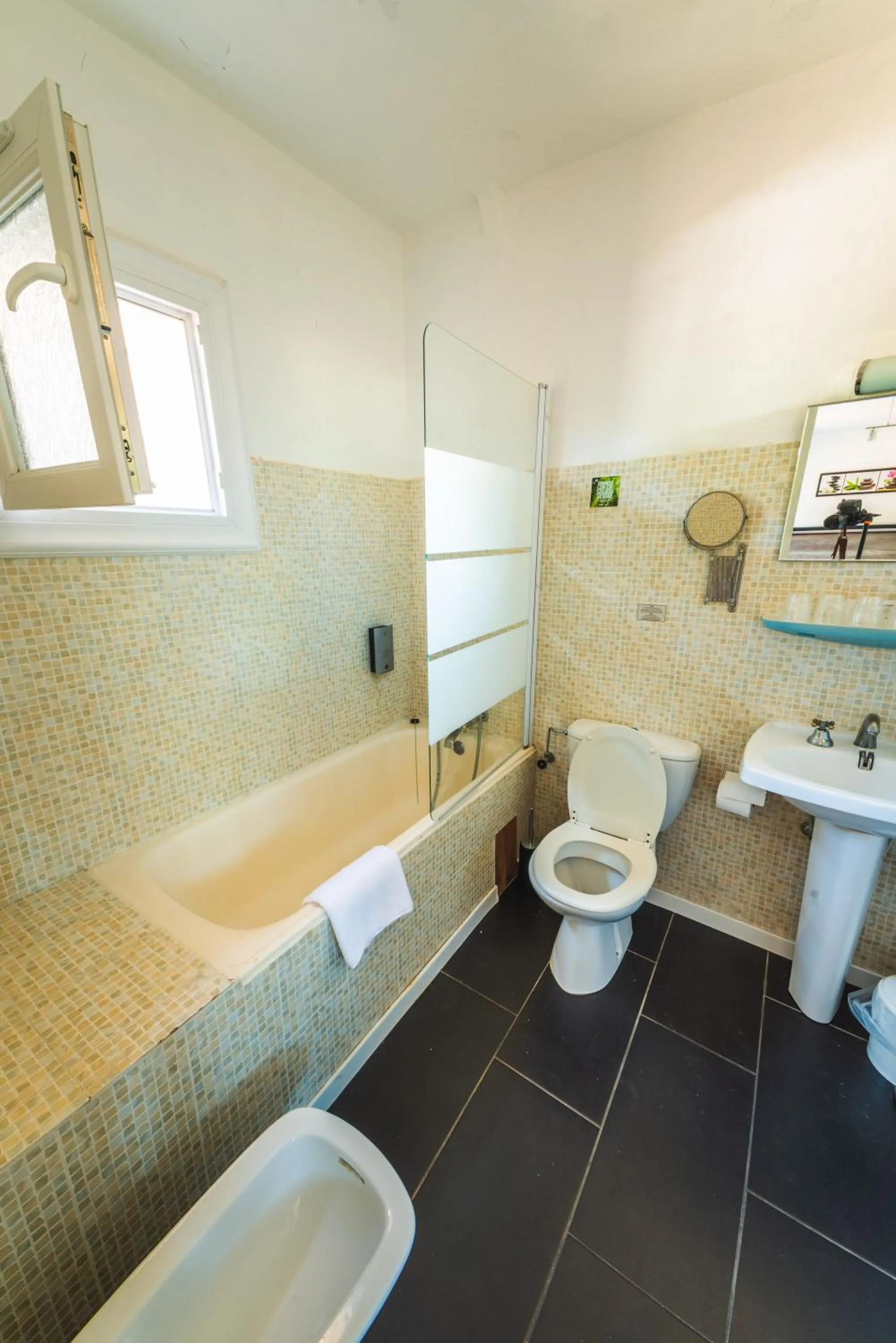 Bathroom in Logis Hôtels La Bastide des Golfs