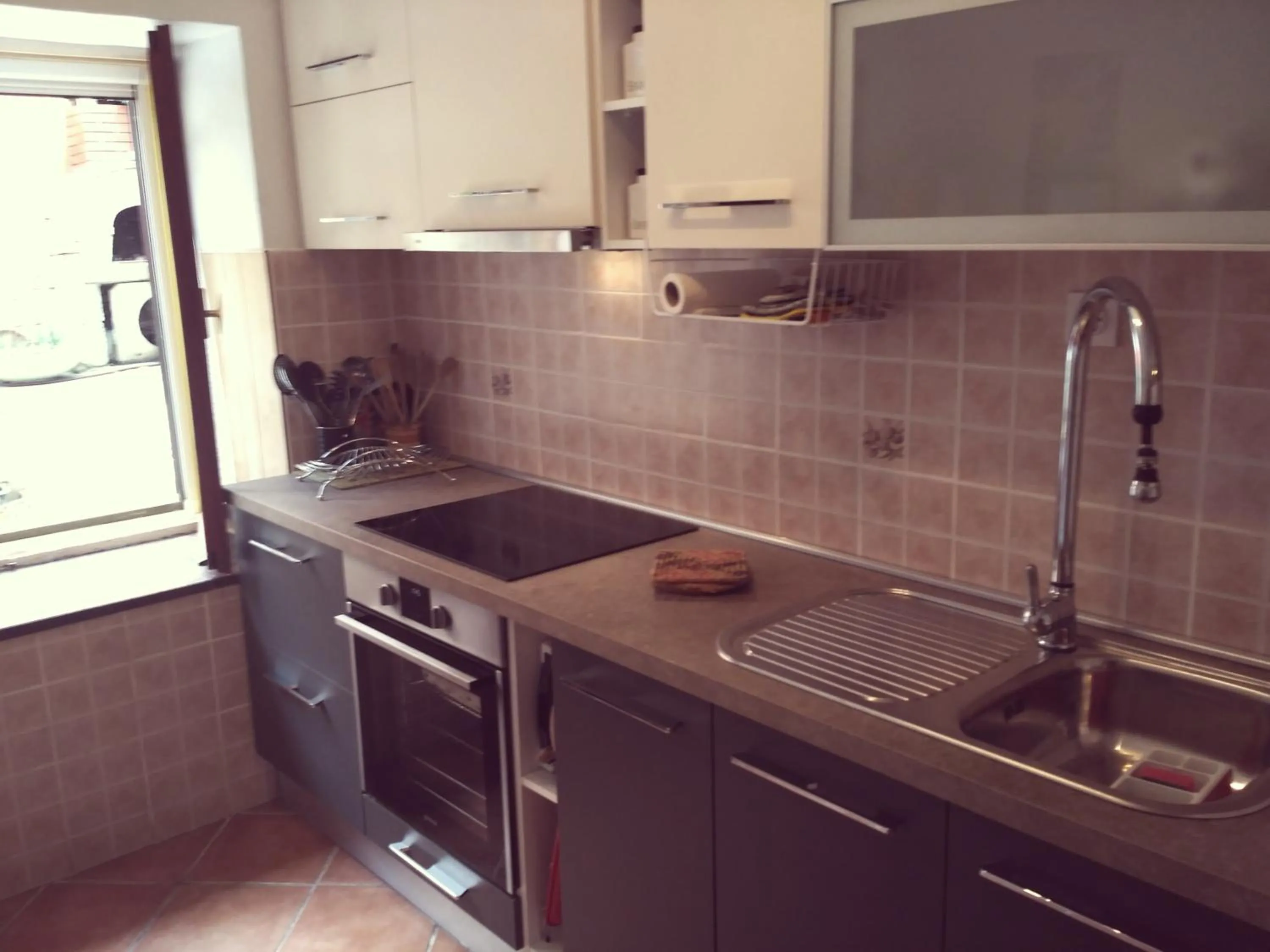 Kitchen or kitchenette in Apartman Nadia