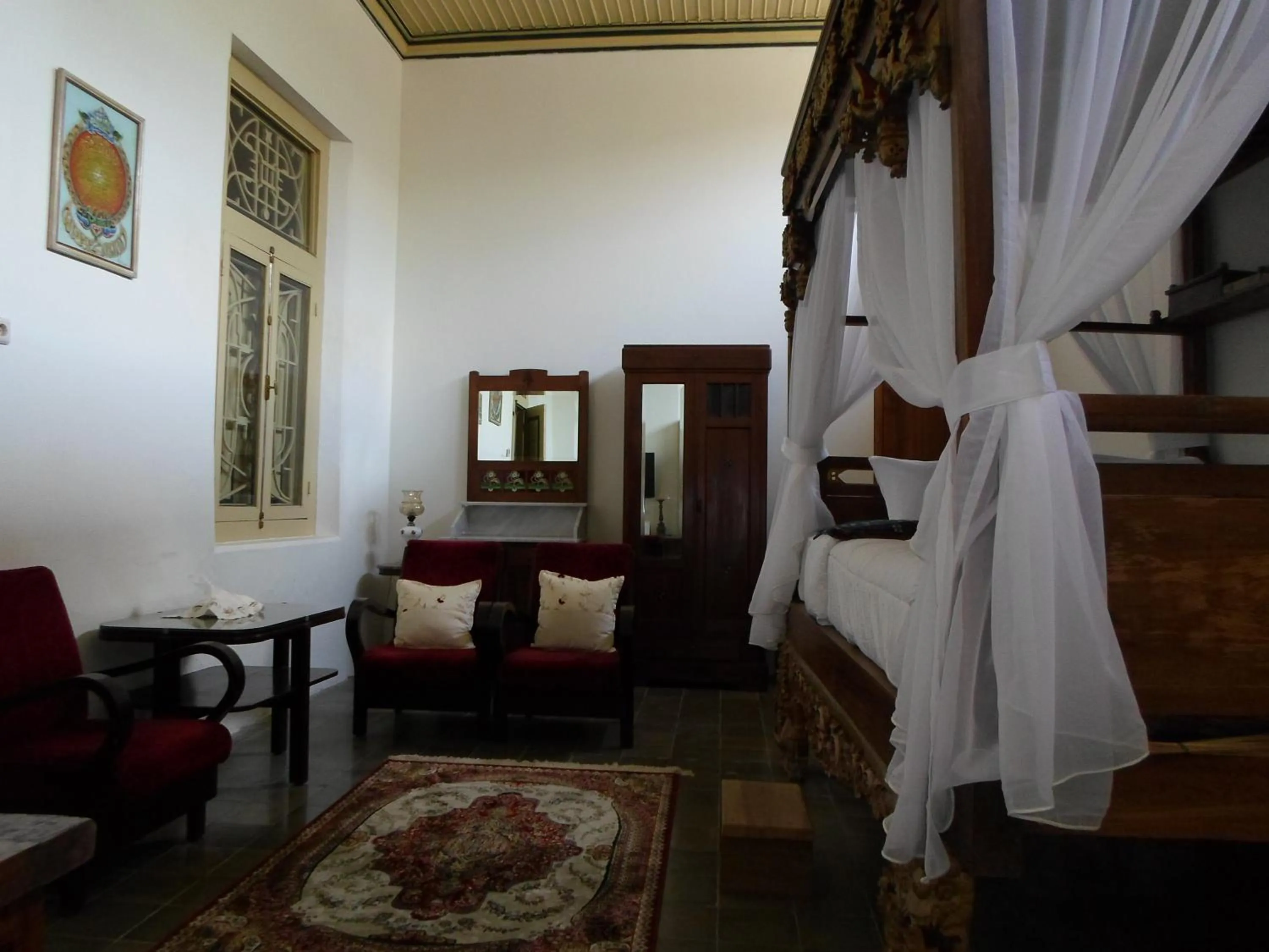Bedroom in nDalem Natan Royal Heritage