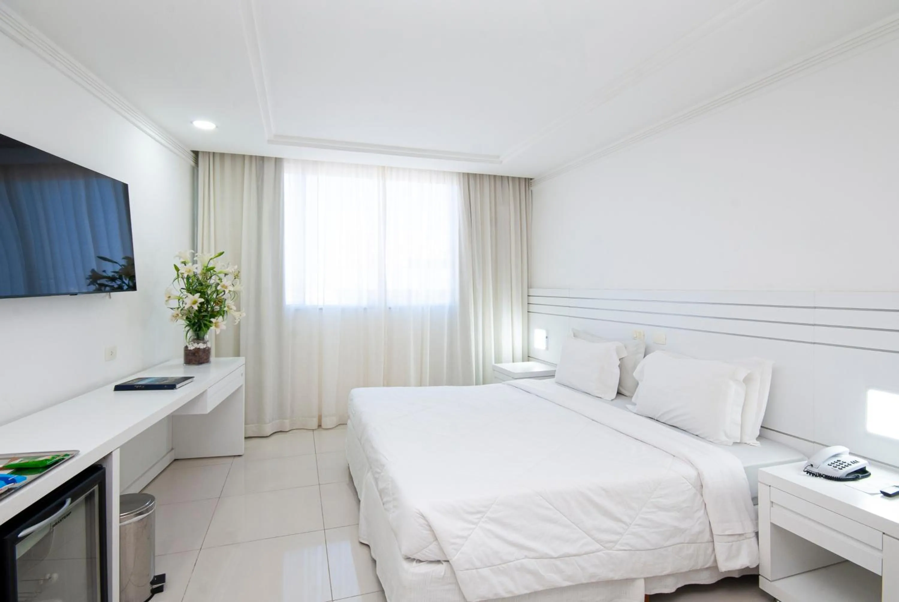 Bed in Hotel Bandeirantes