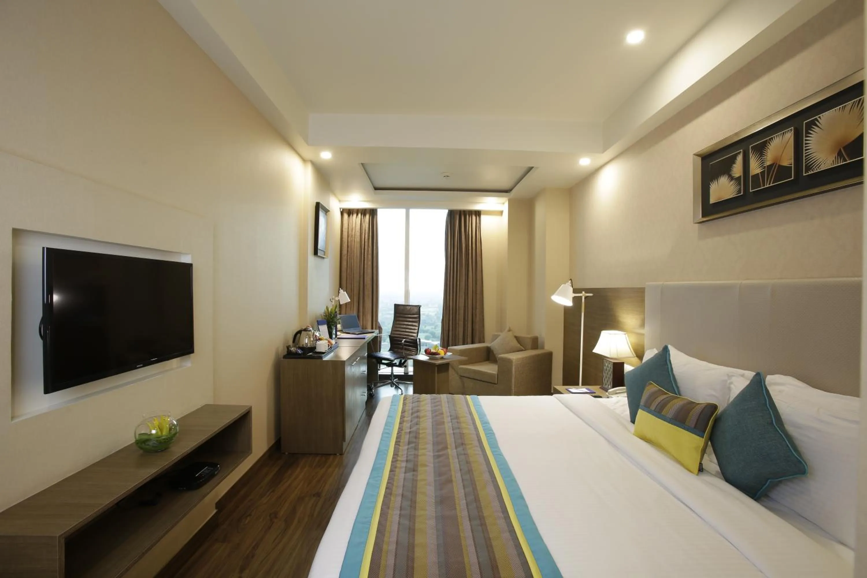 Bed in Golden Suites Gurgaon Inde Hotels