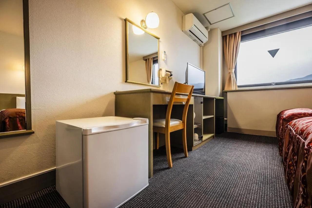 Bed in Asahi Century Hotel