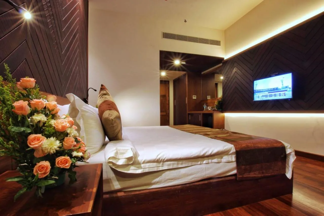 Bed in Woodies Bleisure Hotel