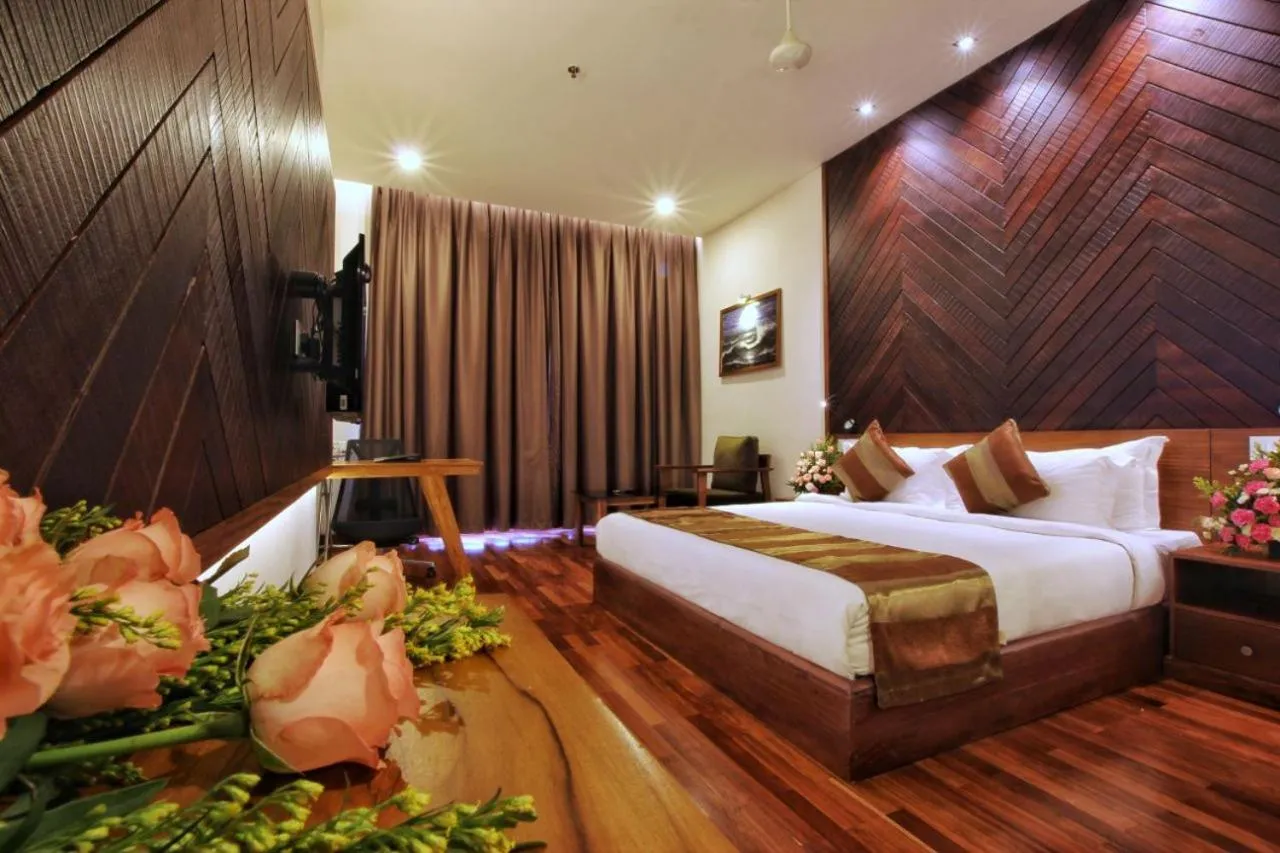Bed in Woodies Bleisure Hotel