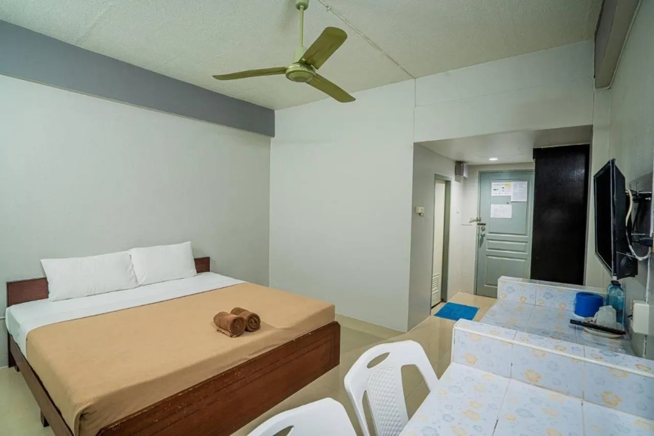 Bed in Pasawang Hotel (โรงแรมภาสว่าง)