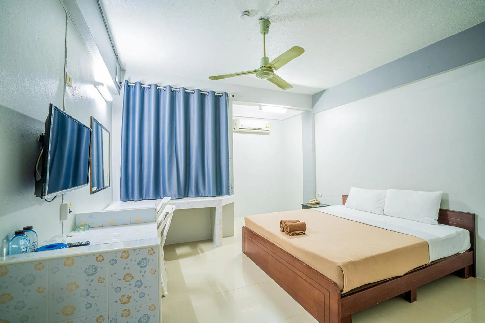 Bed in Pasawang Hotel (โรงแรมภาสว่าง)