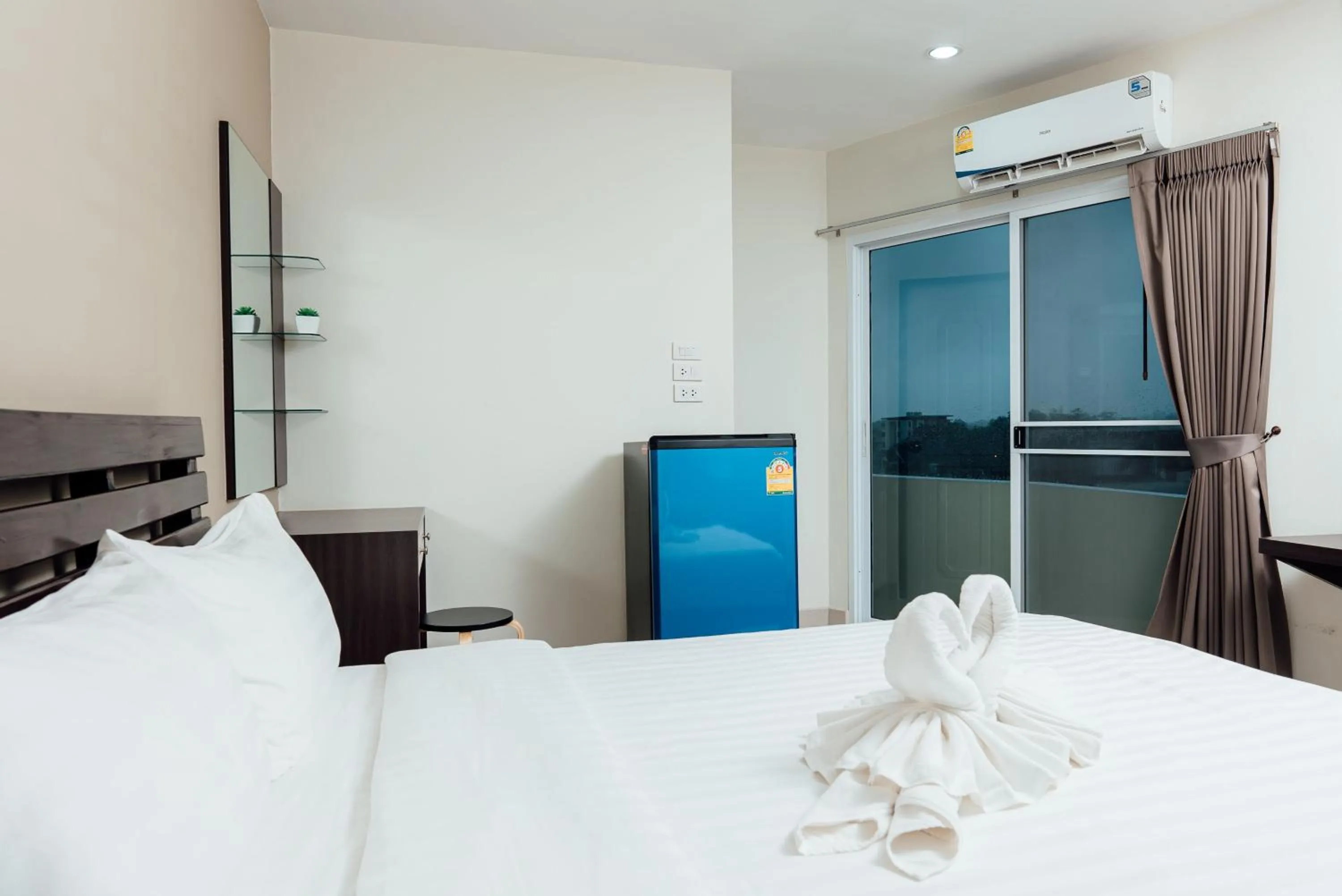 Bed in Corner One Residence