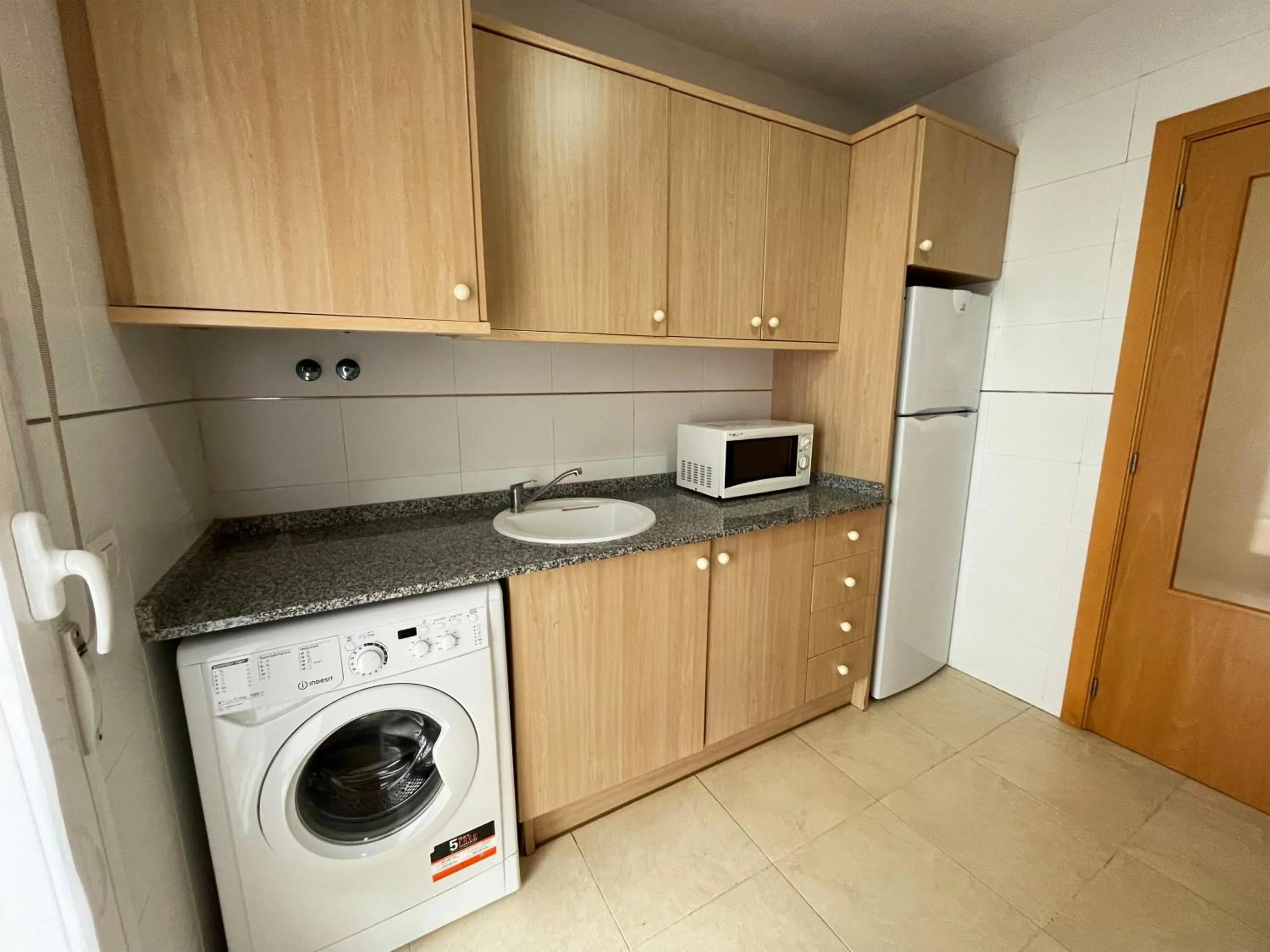 Kitchen or kitchenette in Apartamentos Los Almendros 3000