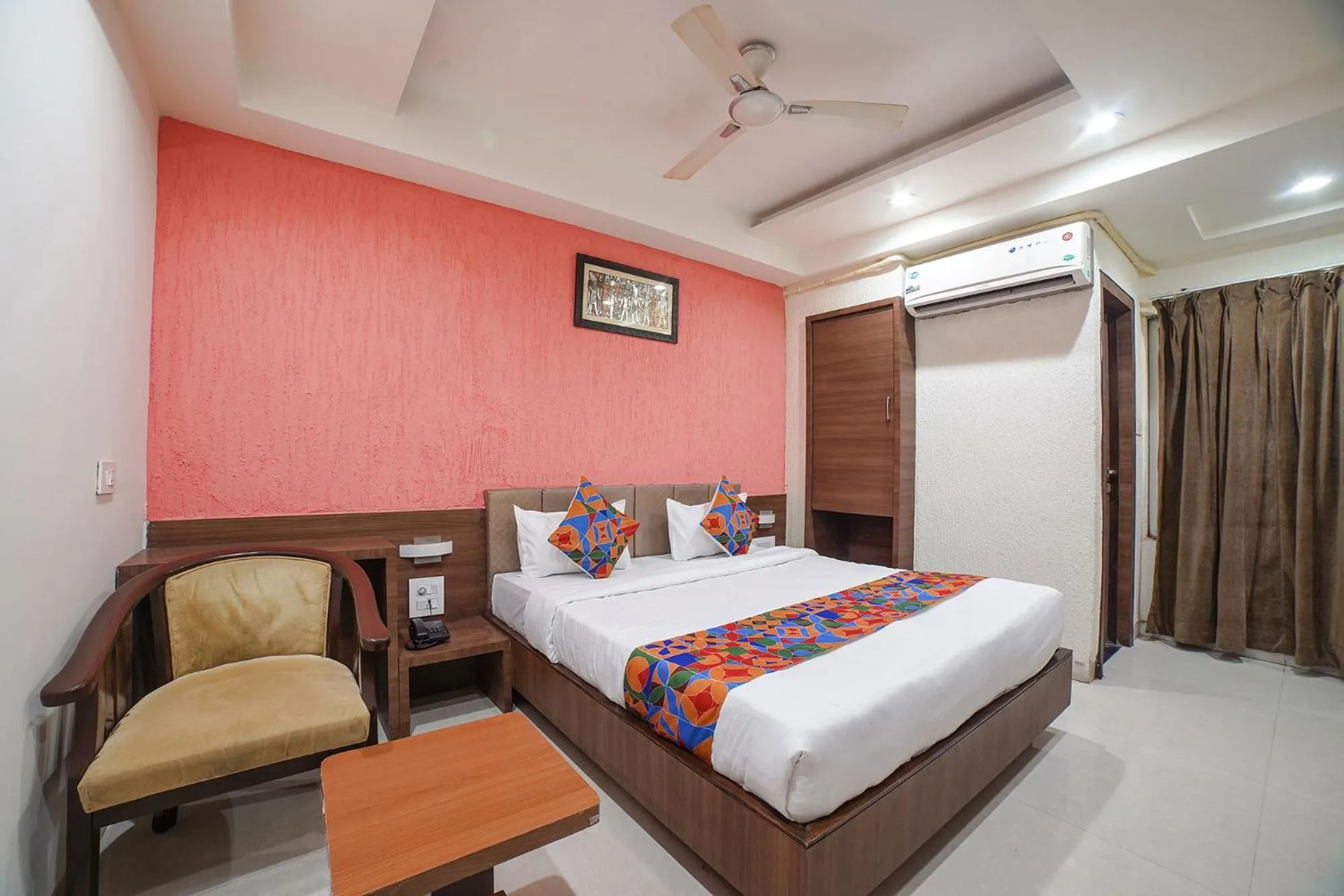 Bed in FabHotel Johri Regency