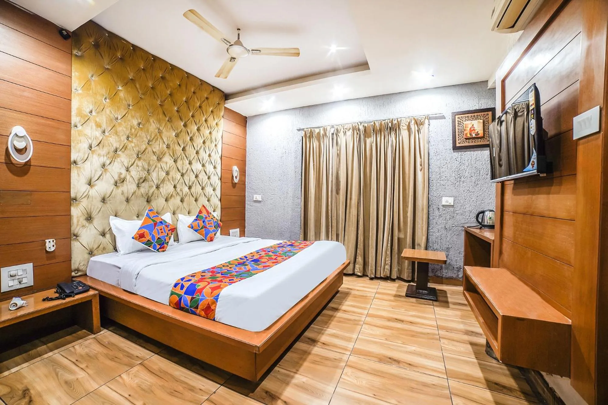 Bed in FabHotel Johri Regency