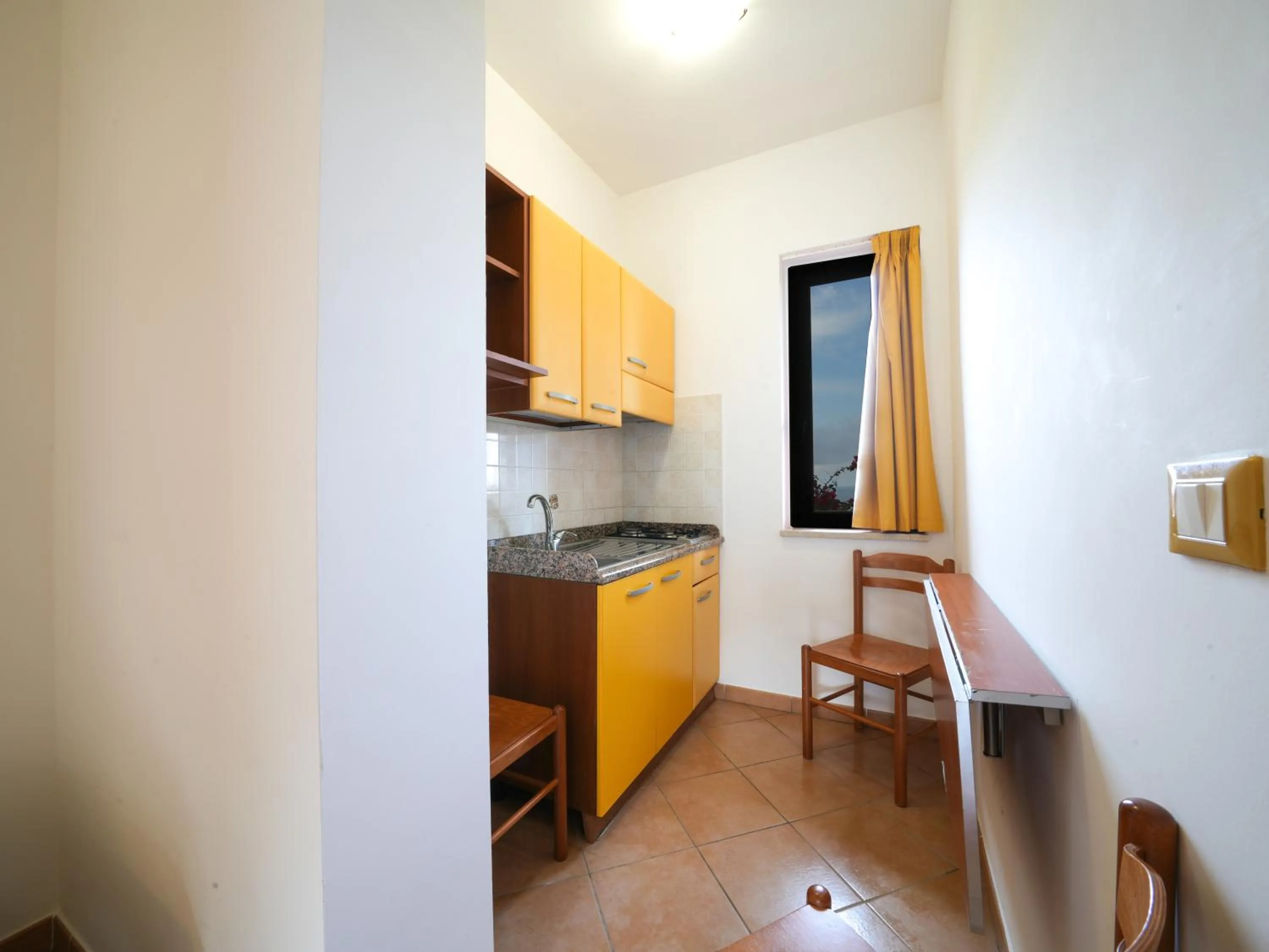 Kitchen or kitchenette in LUZIA AGRIRESORT - Piscina Idromassaggio con Vista Mare Aperta fino alle ore 23-00