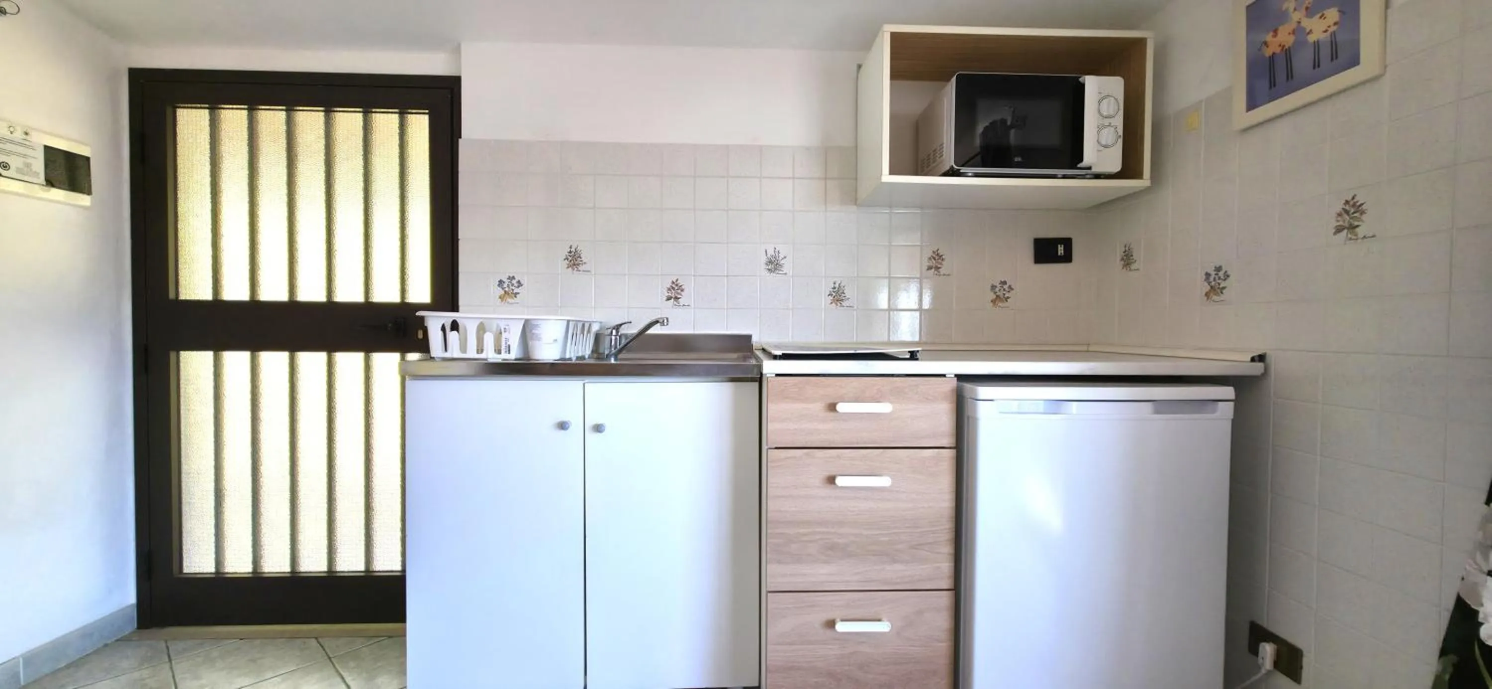 Kitchen or kitchenette in LUZIA AGRIRESORT - Piscina Idromassaggio con Vista Mare Aperta fino alle ore 23-00