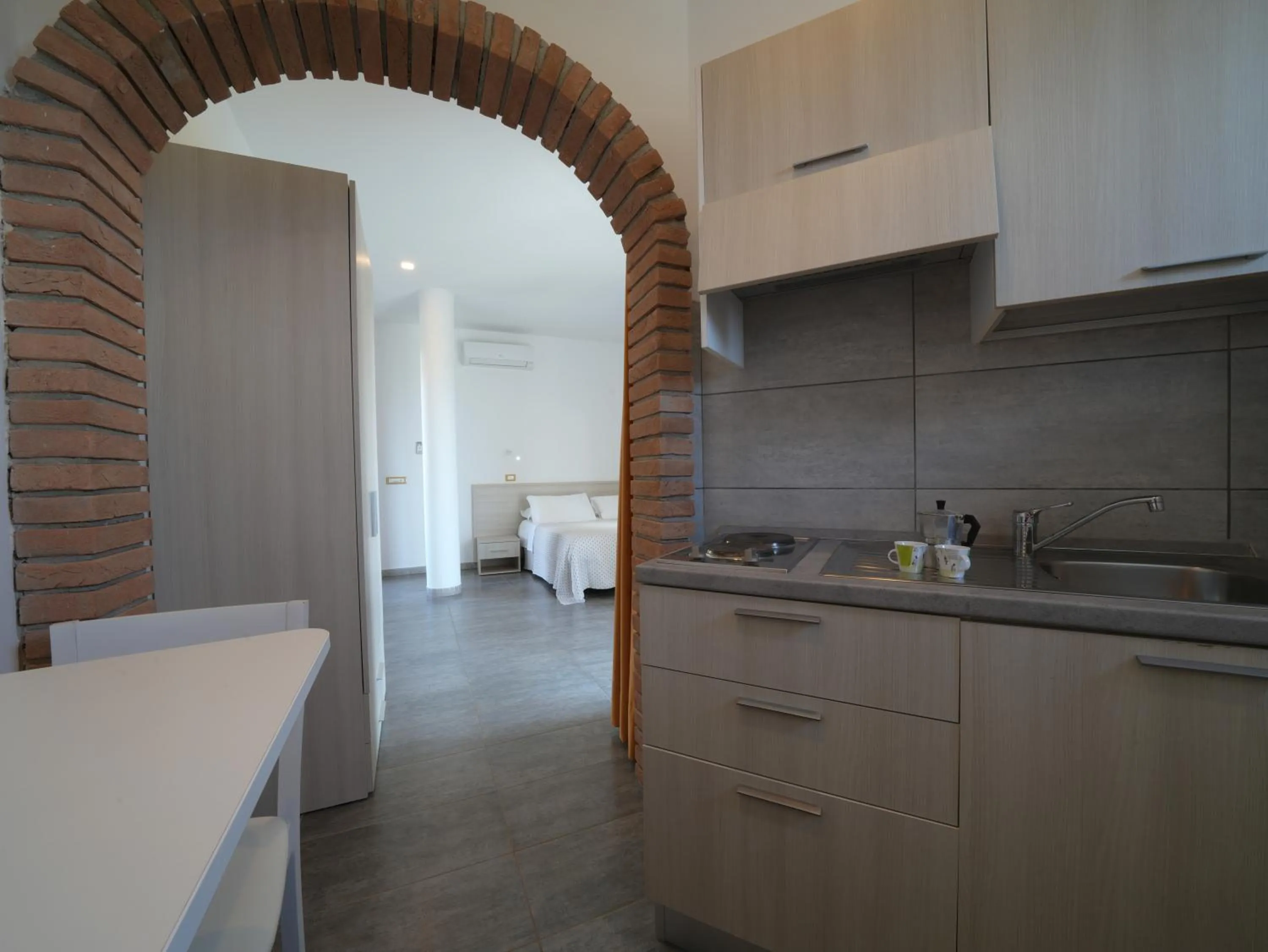 Kitchen or kitchenette in LUZIA AGRIRESORT - Piscina Idromassaggio con Vista Mare Aperta fino alle ore 23-00