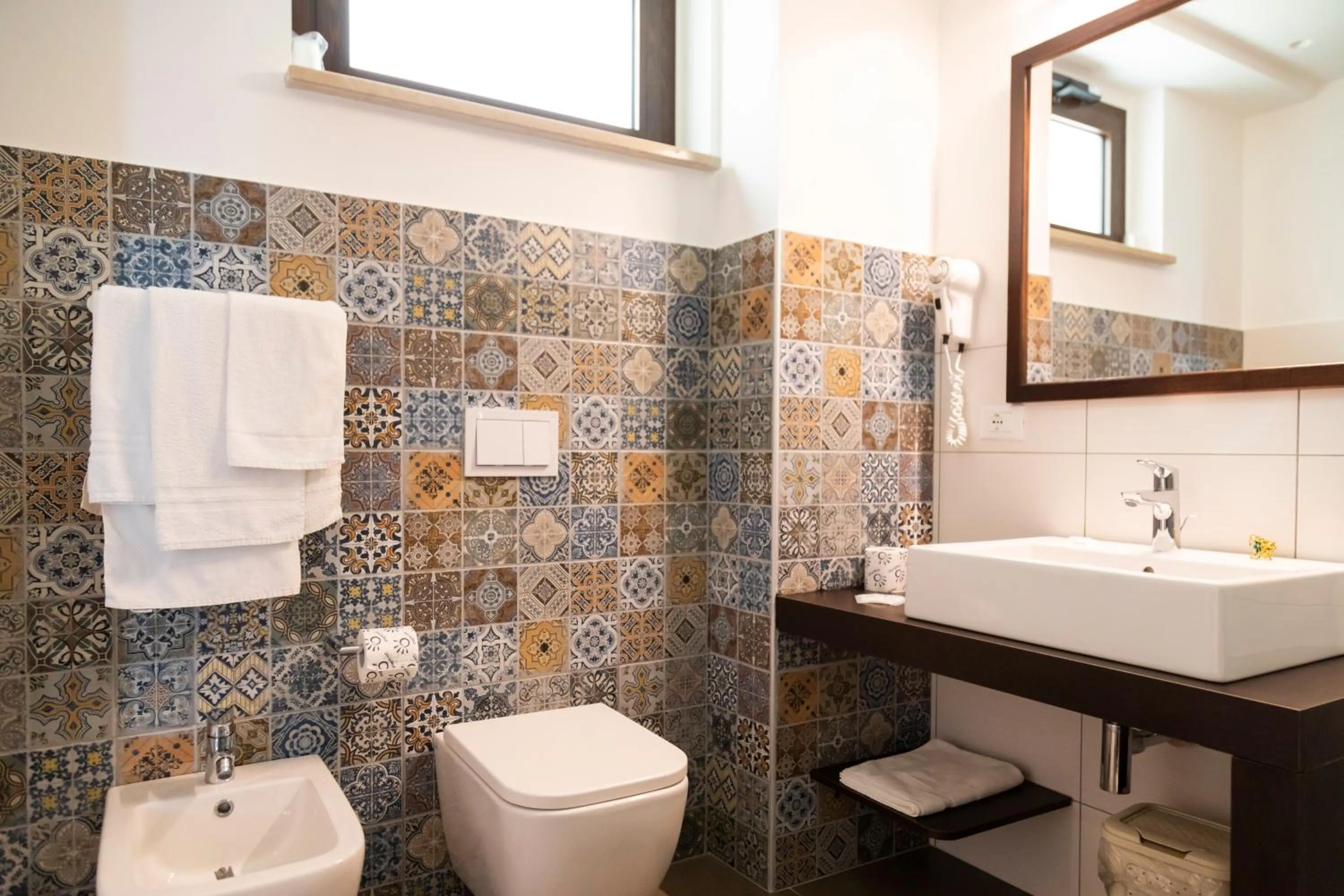 Bathroom in LUZIA AGRIRESORT - Piscina Idromassaggio con Vista Mare Aperta fino alle ore 23-00