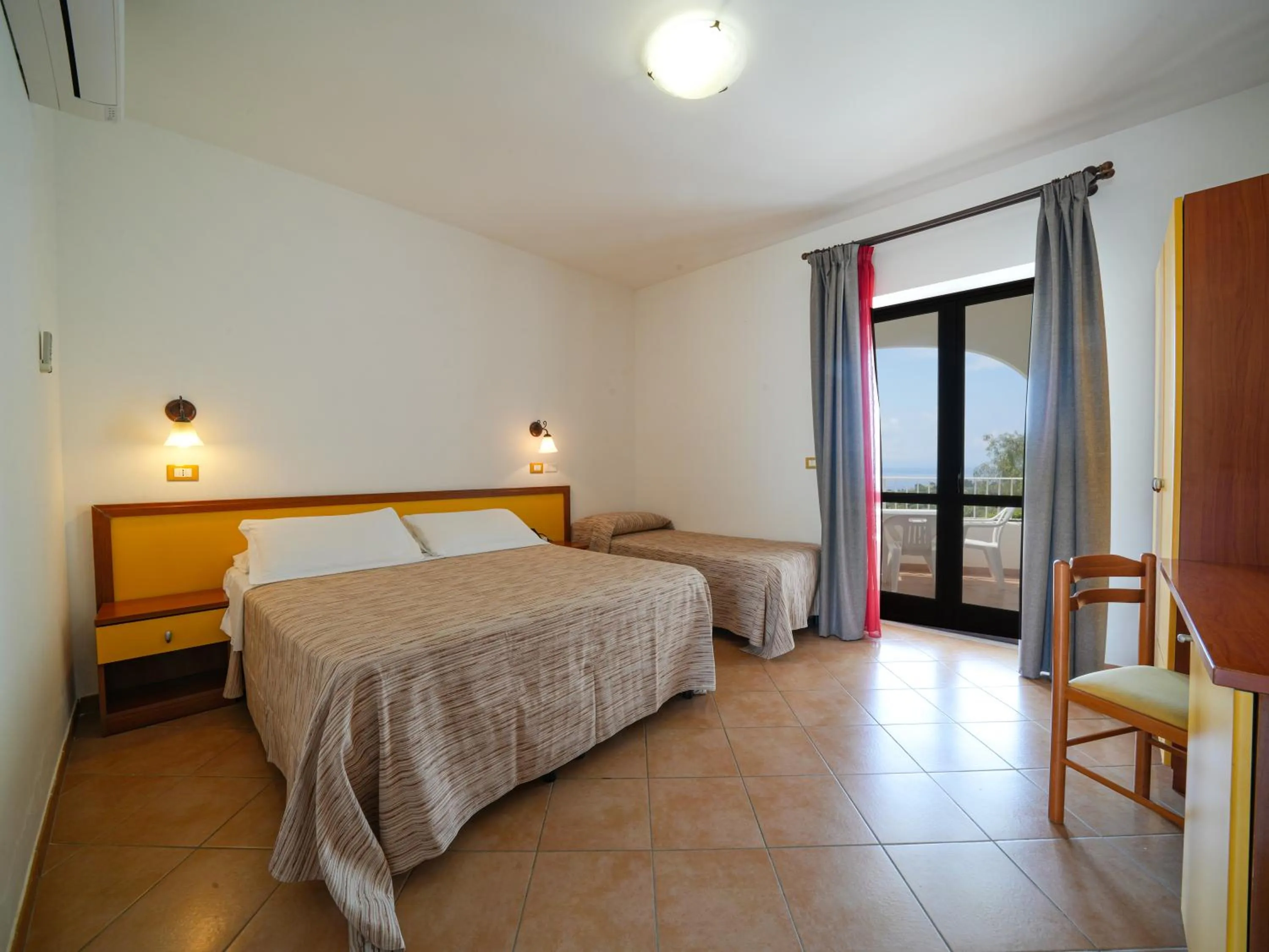 Photo of the whole room, Bed in LUZIA AGRIRESORT - Piscina Idromassaggio con Vista Mare Aperta fino alle ore 23-00
