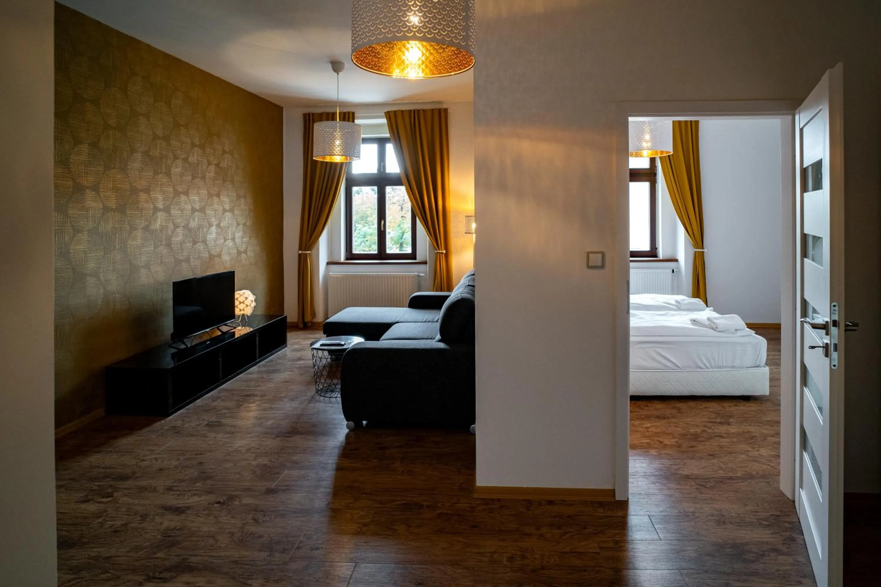 Living room, Bed in Apartmany Pisek