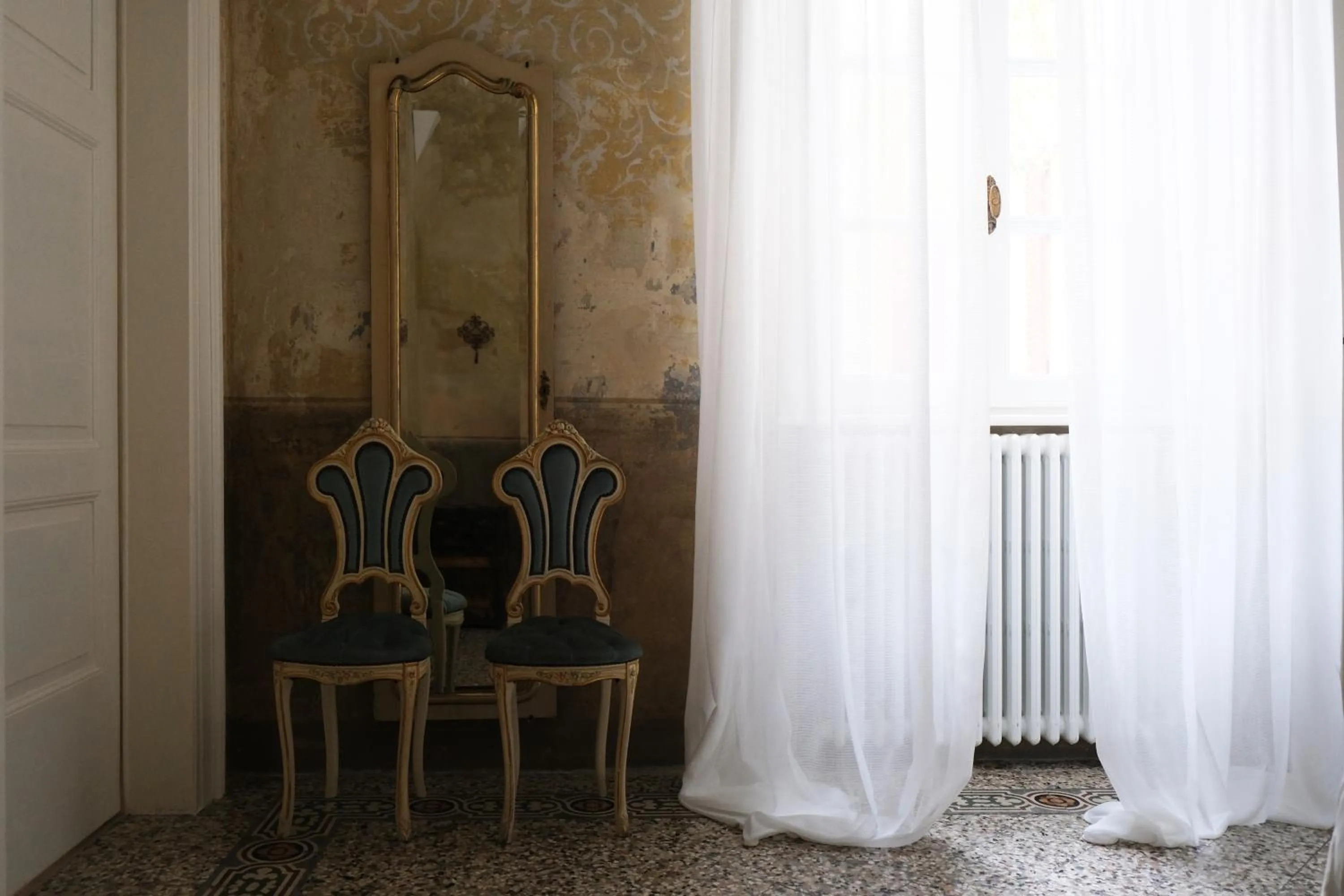 Decorative detail in Palazzo Albricci Peregrini