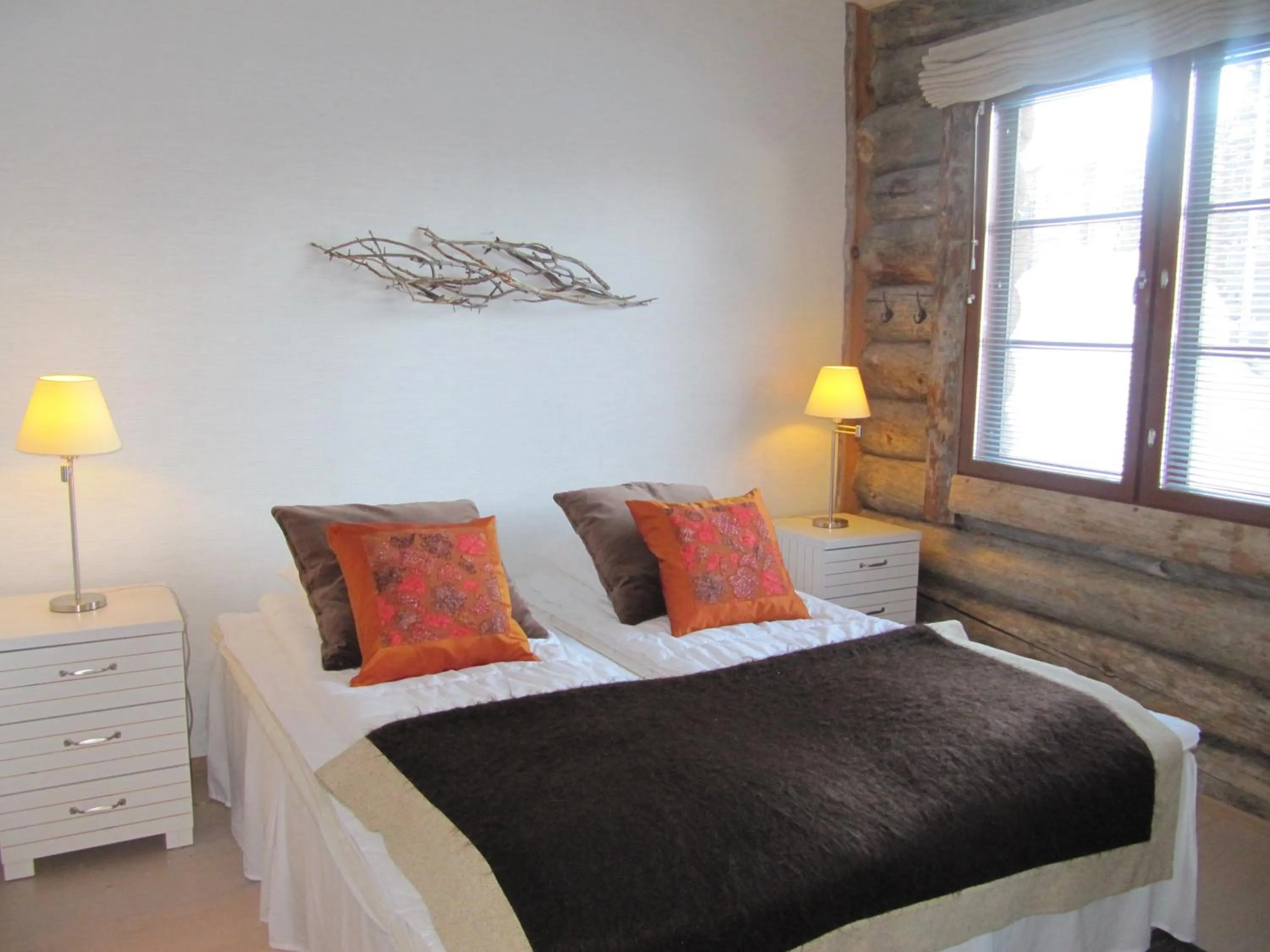 Bed in Lapin Kutsu Log Cabins