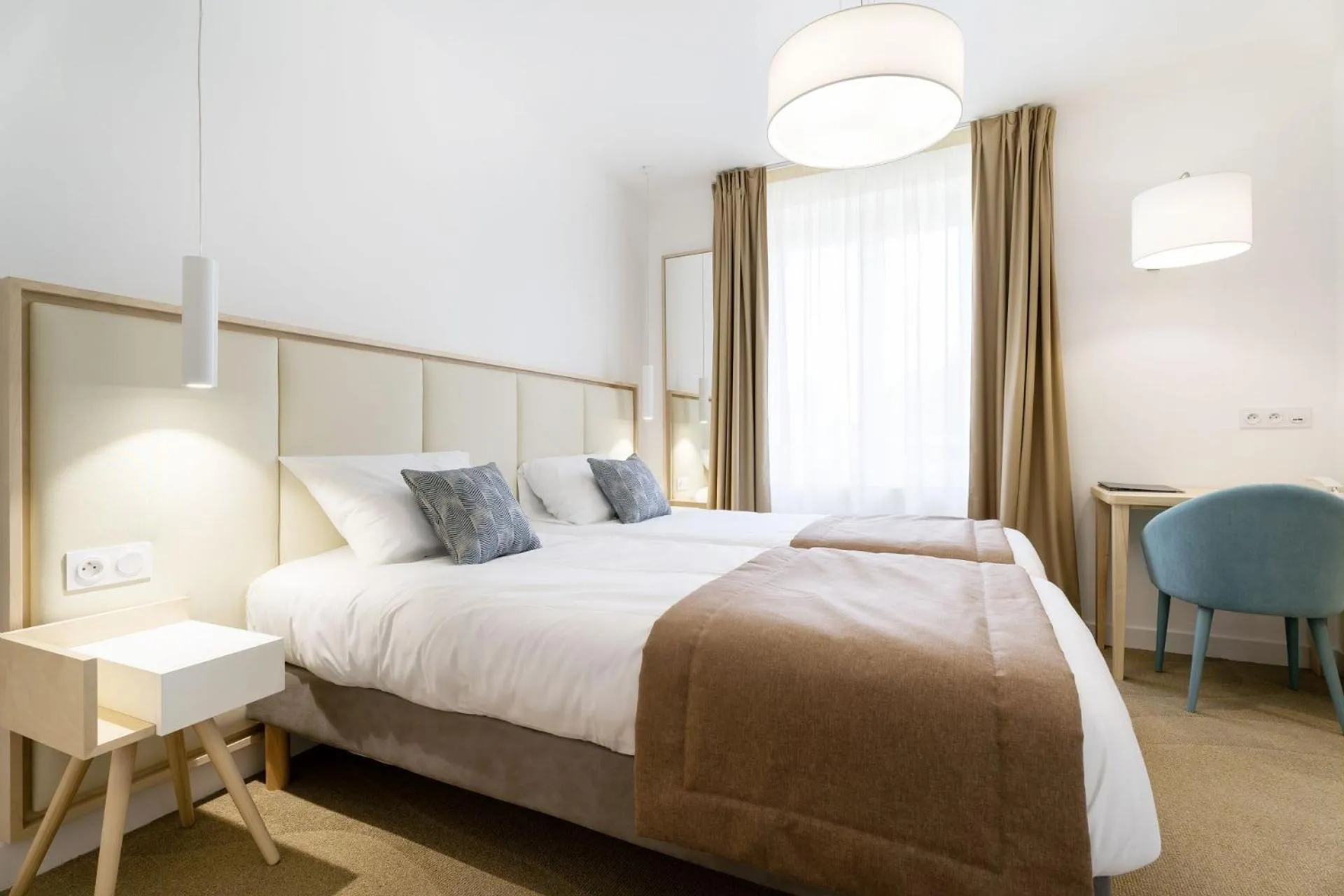 Bed in Hôtel Miléade Les Pléïades La Baule