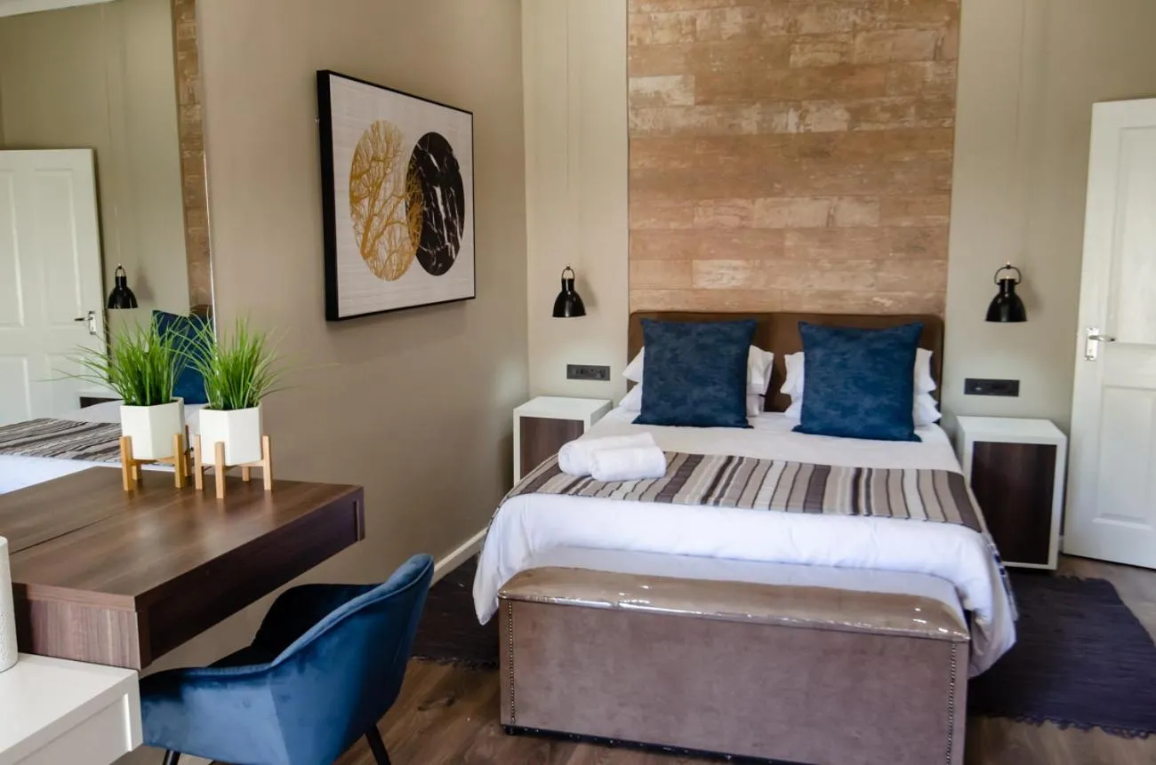 Bed in The Royal Guest House