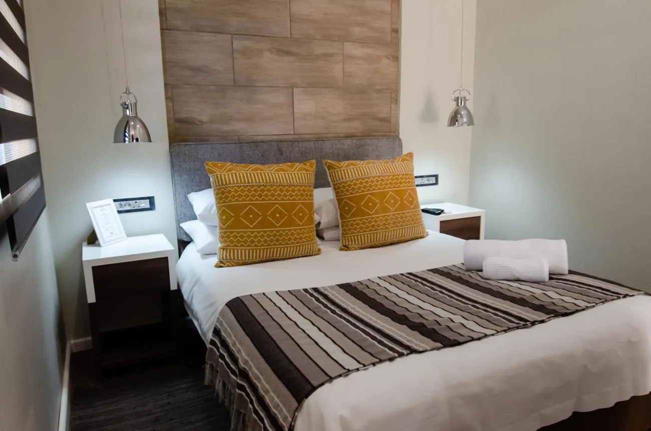 Bed in The Royal Guest House