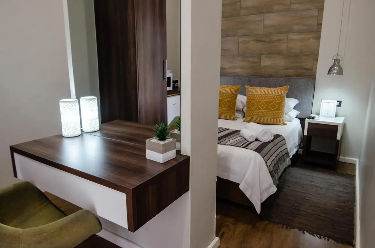 Bed in The Royal Guest House