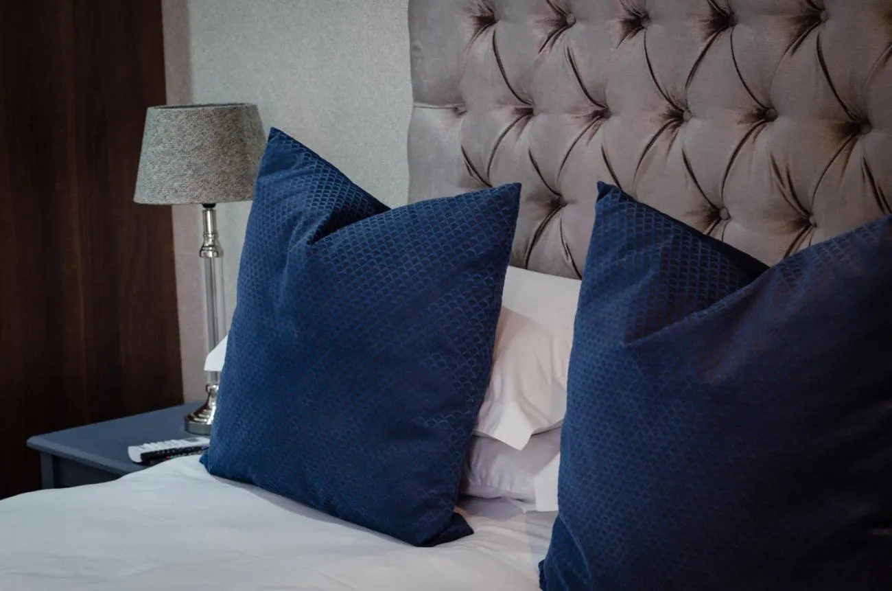 Bed in The Royal Guest House