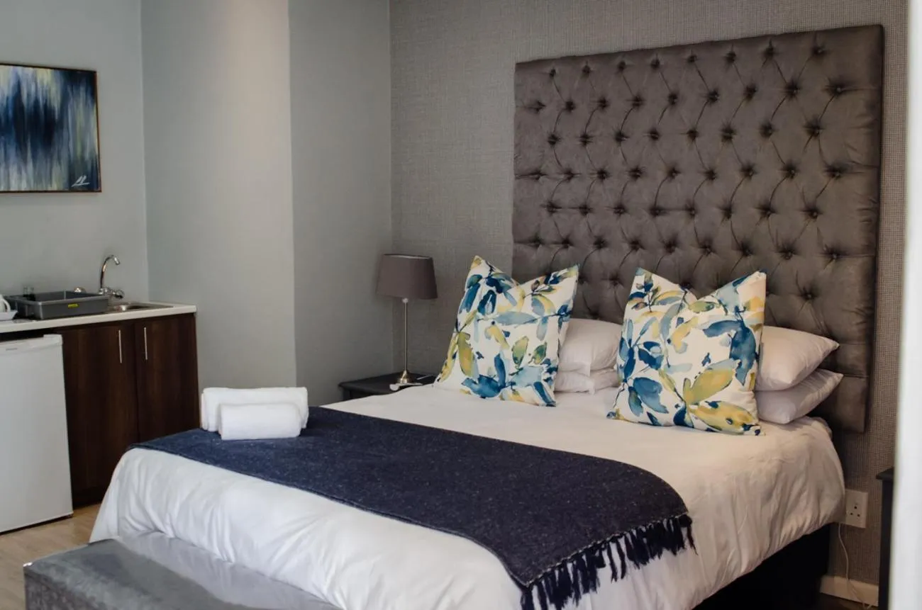 Bed in The Royal Guest House