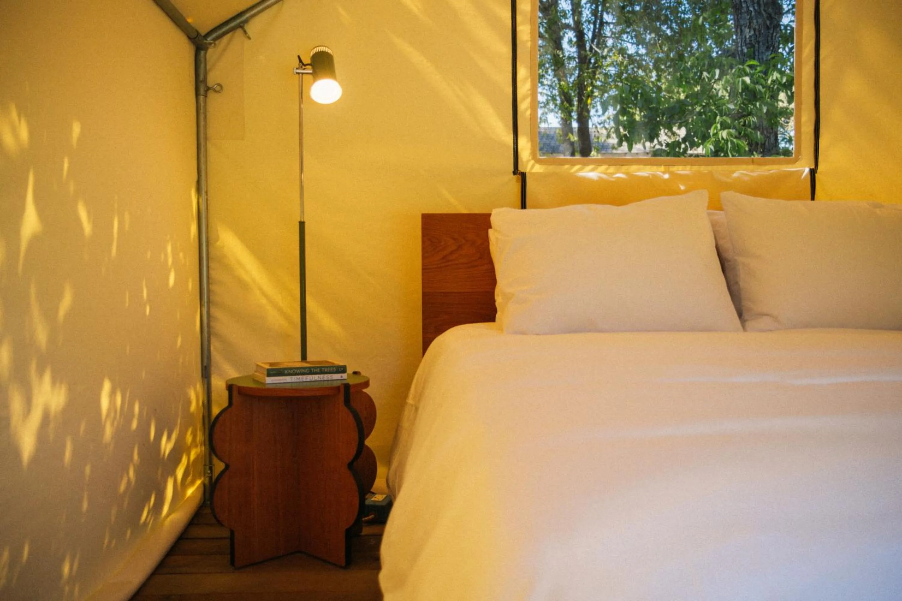Bed in Johnson's Beach Cabins and Campground