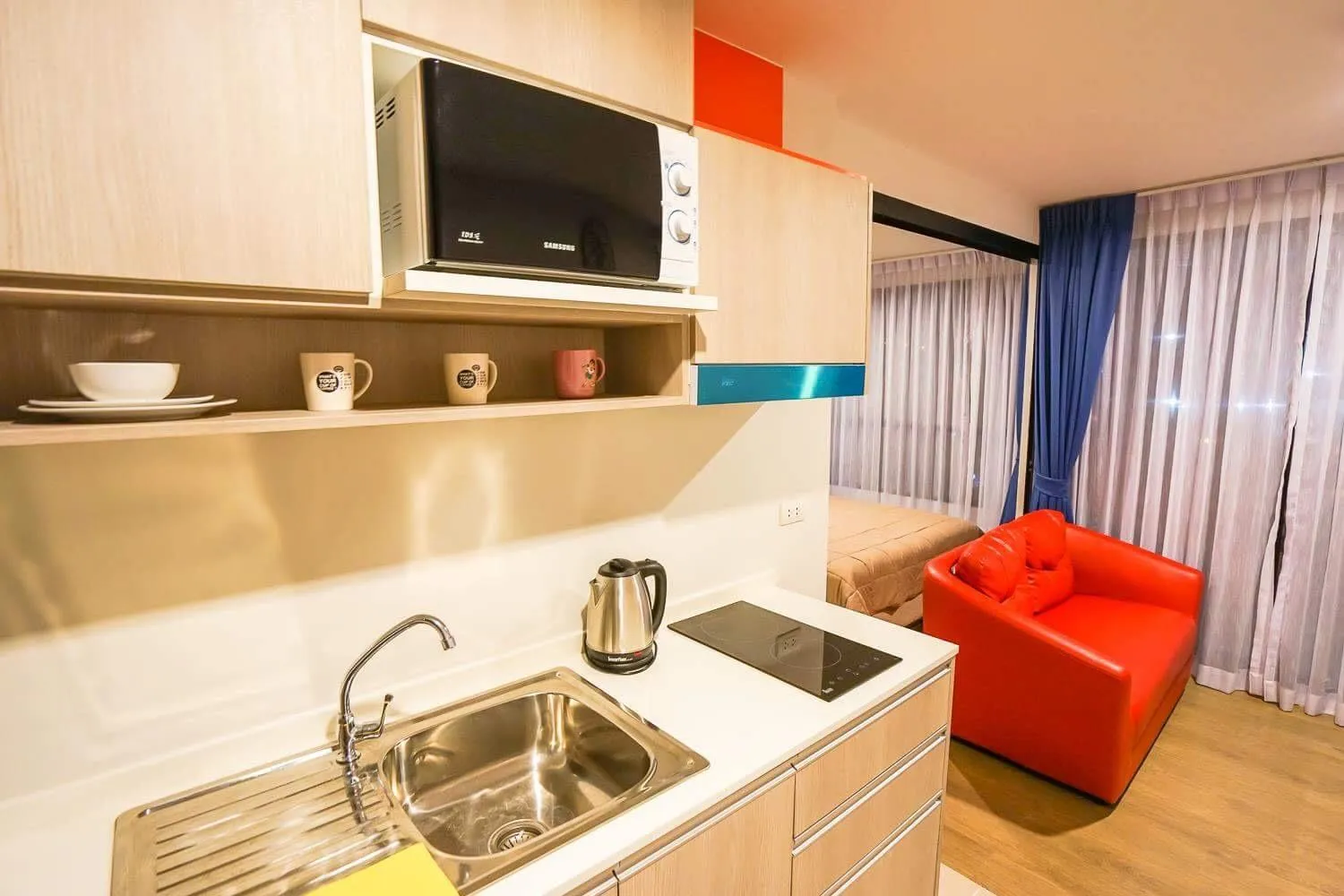 Kitchen or kitchenette in Centrio by Suttirak