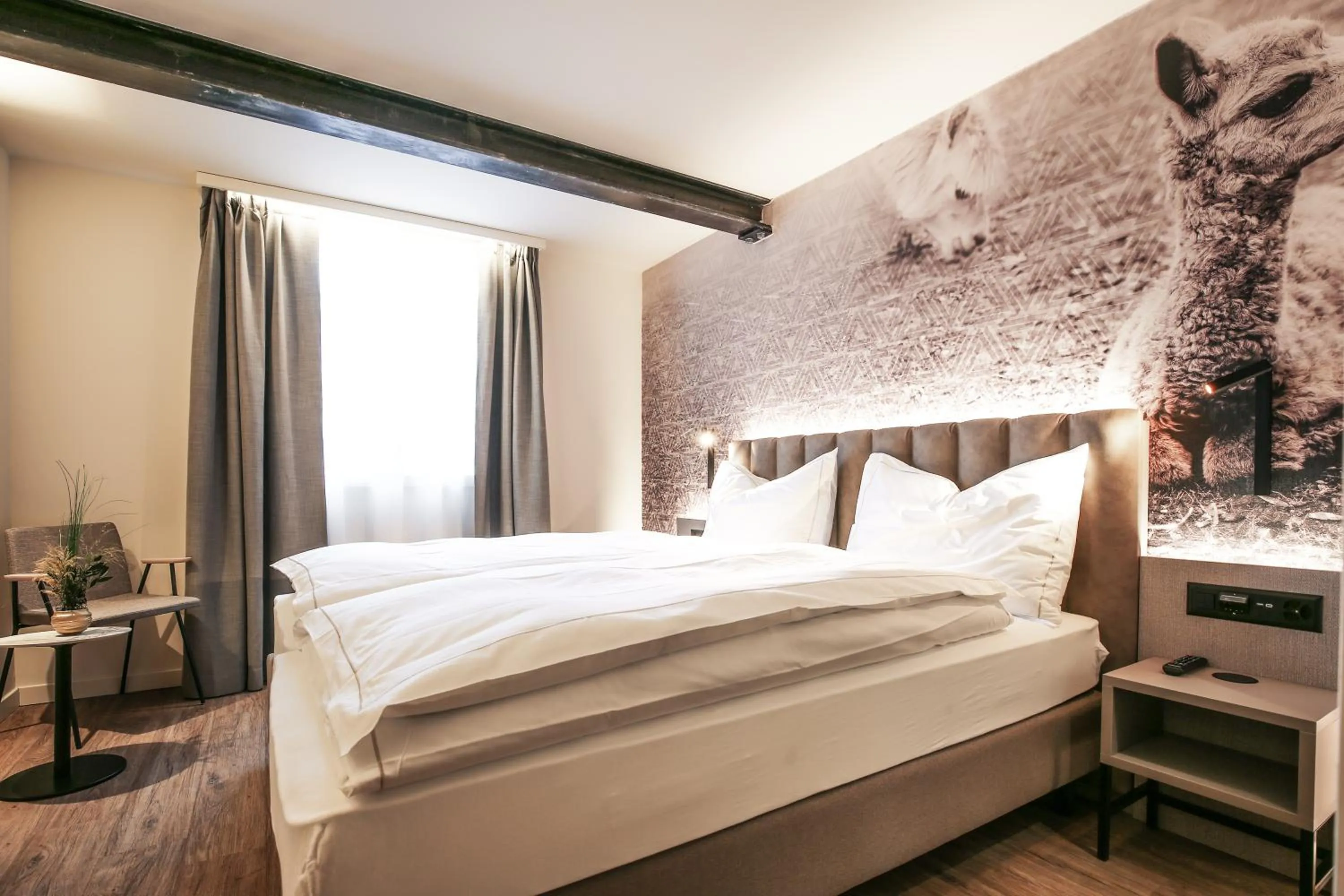 Bed in Adaastra Boutique Hotel