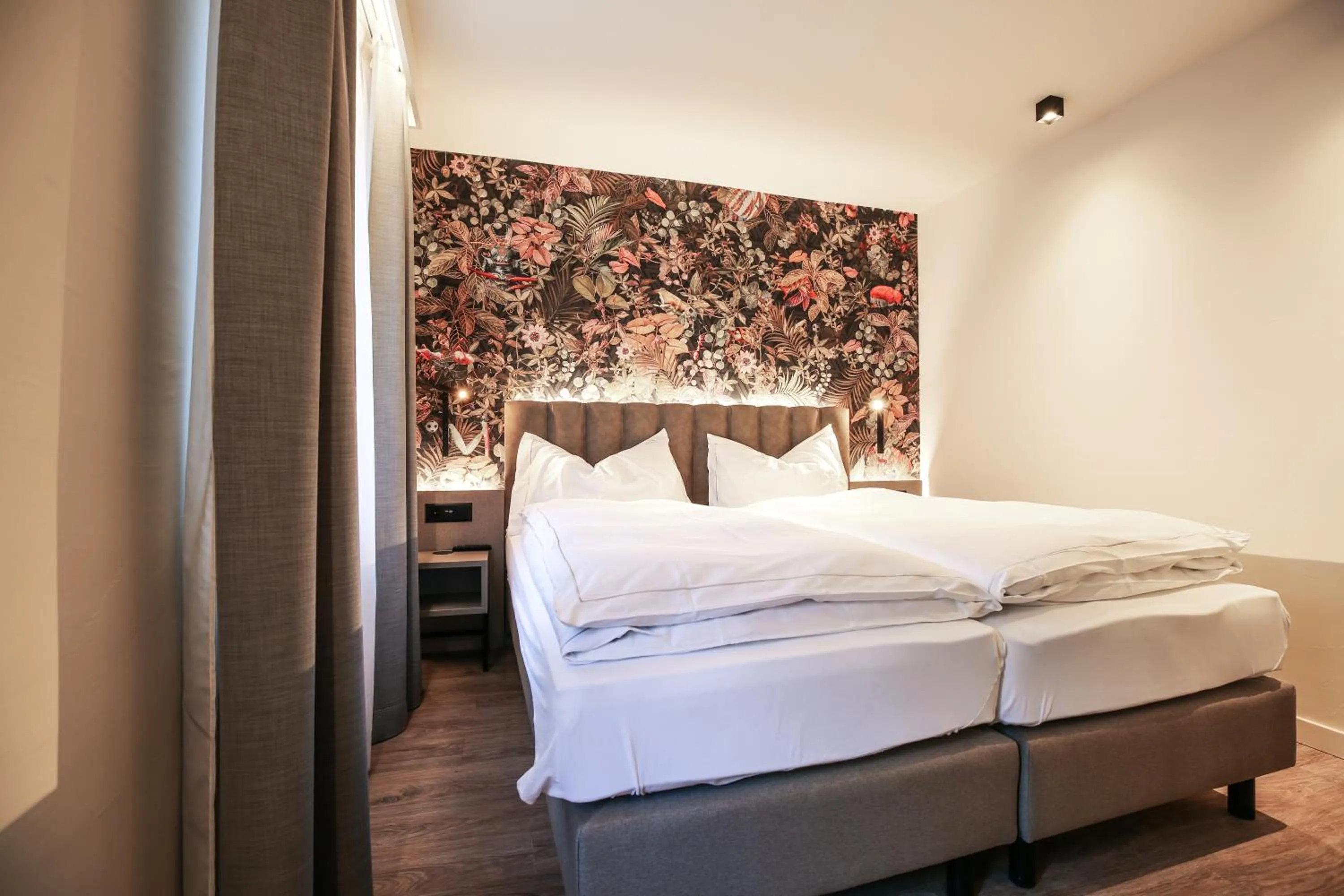 Bed in Adaastra Boutique Hotel