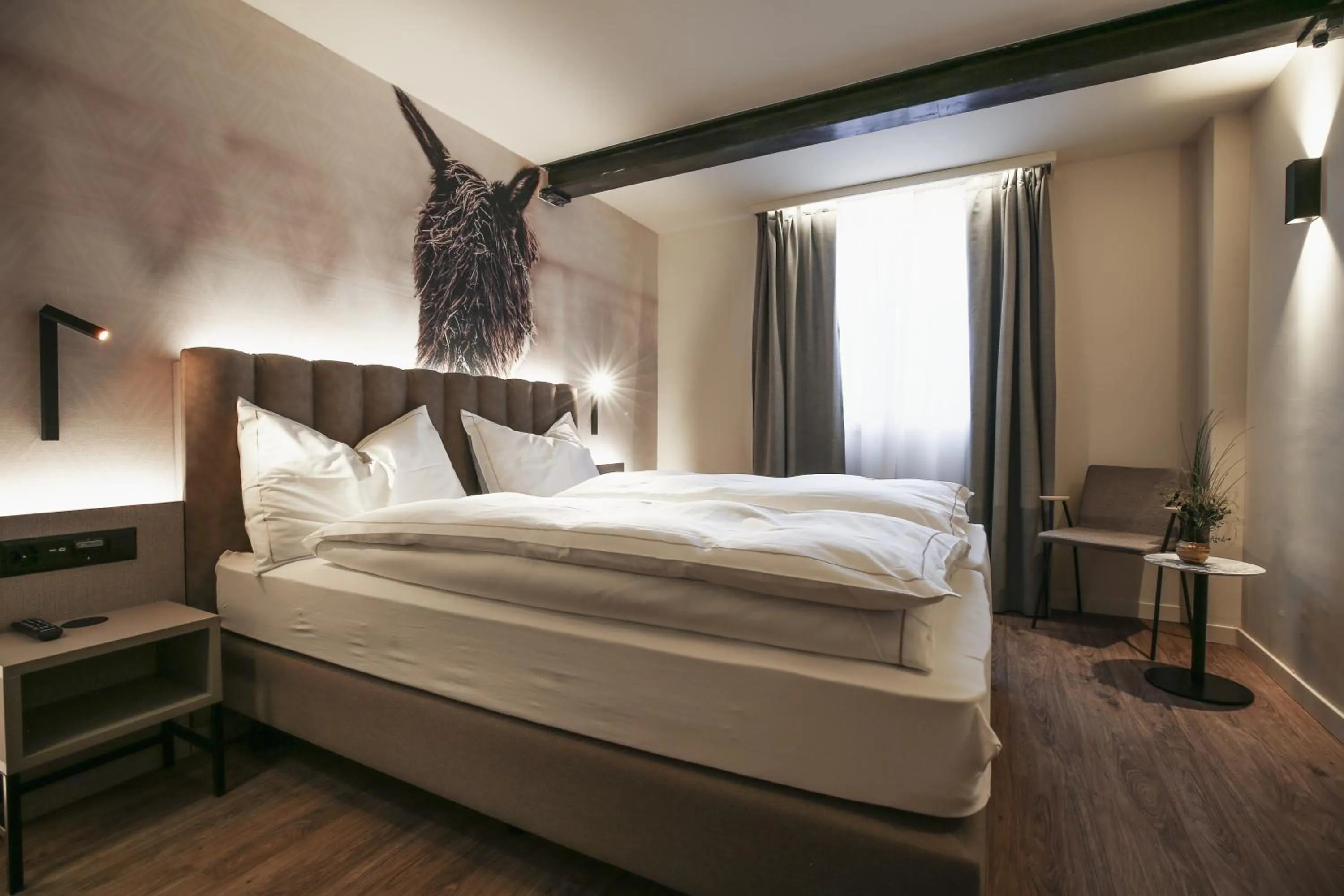 Bed in Adaastra Boutique Hotel