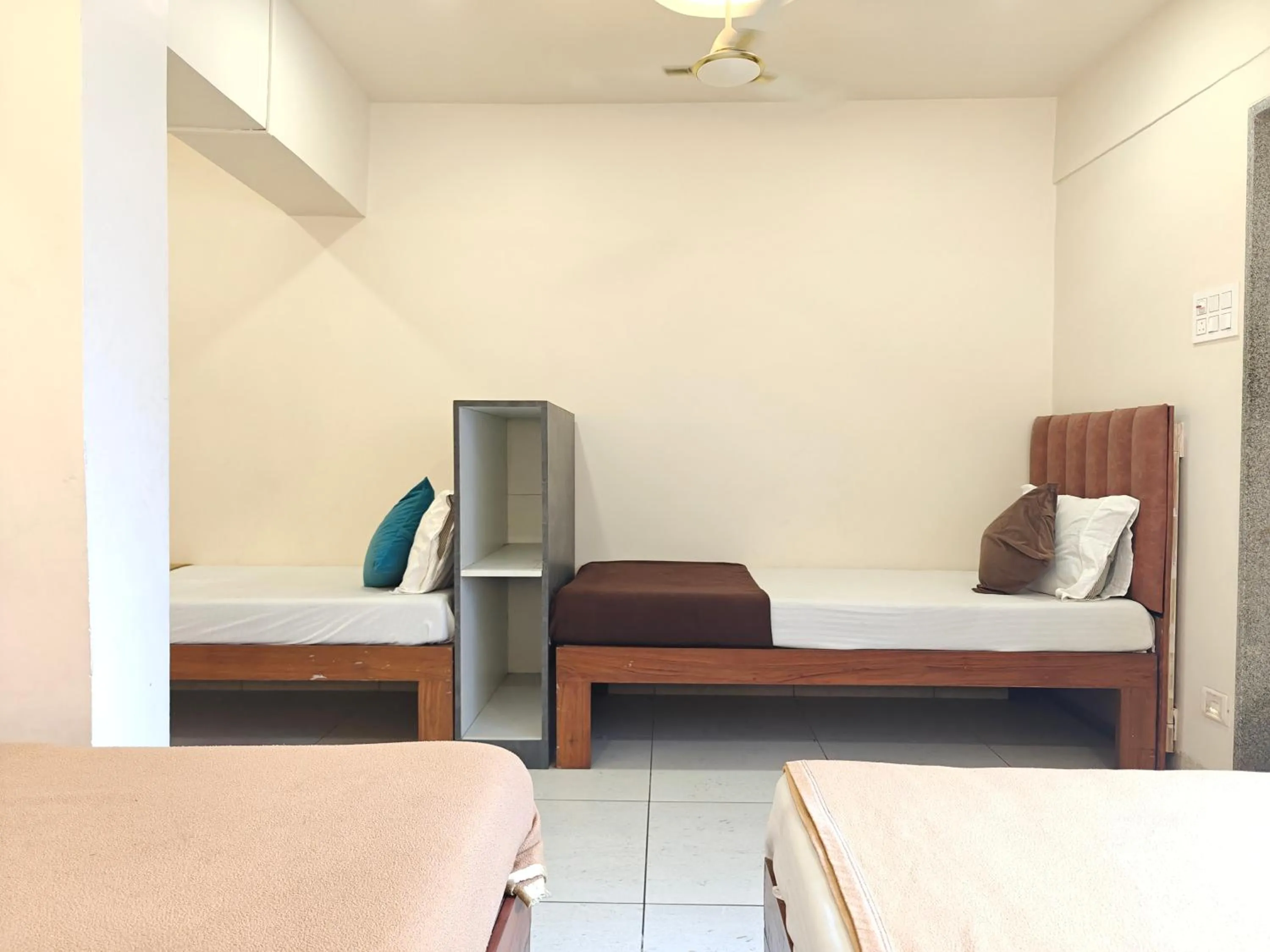 Bed in Central Inn, Kolhapur