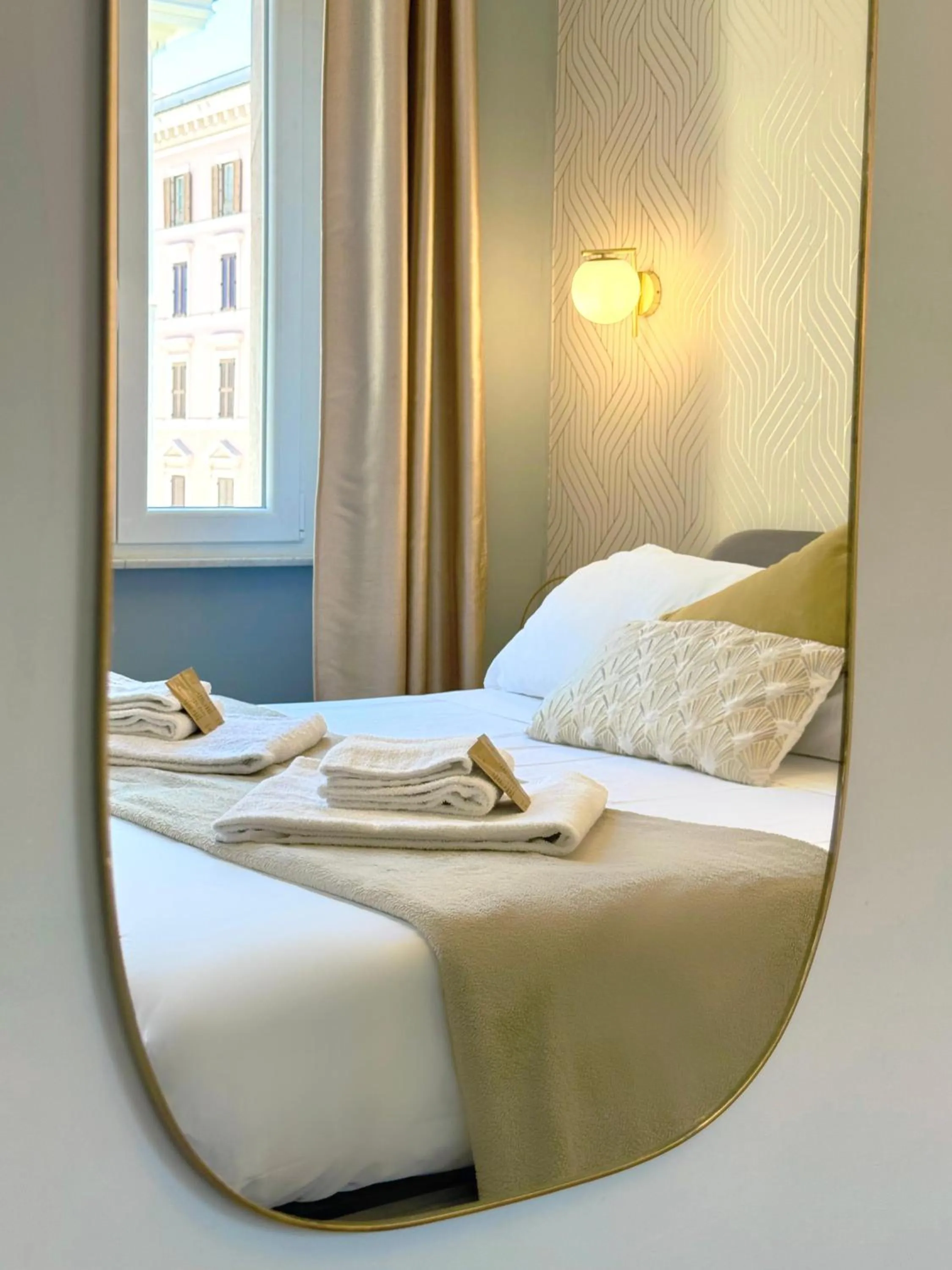 Bed in San Pietro Rooms 84