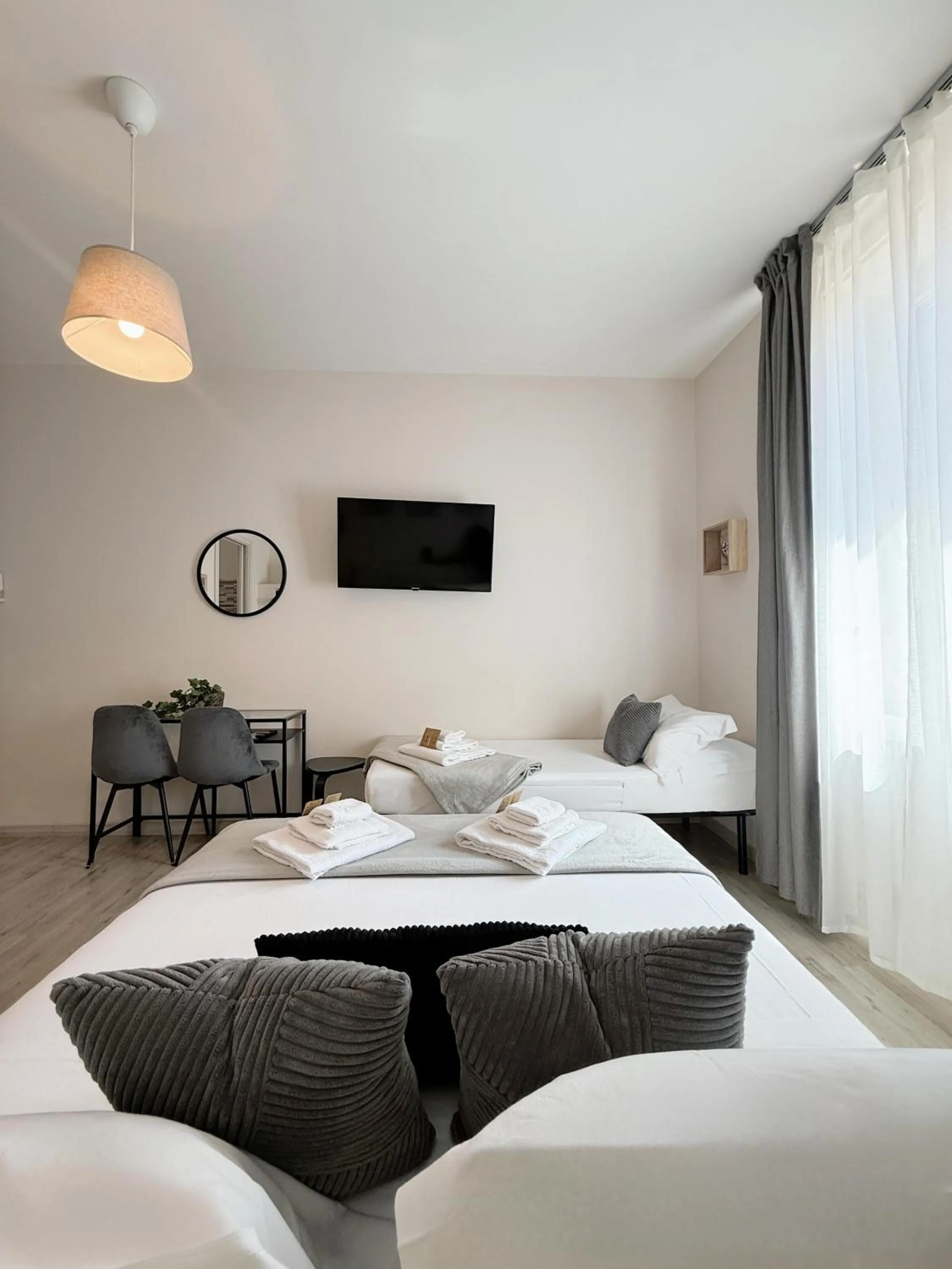 Bed in San Pietro Rooms 84