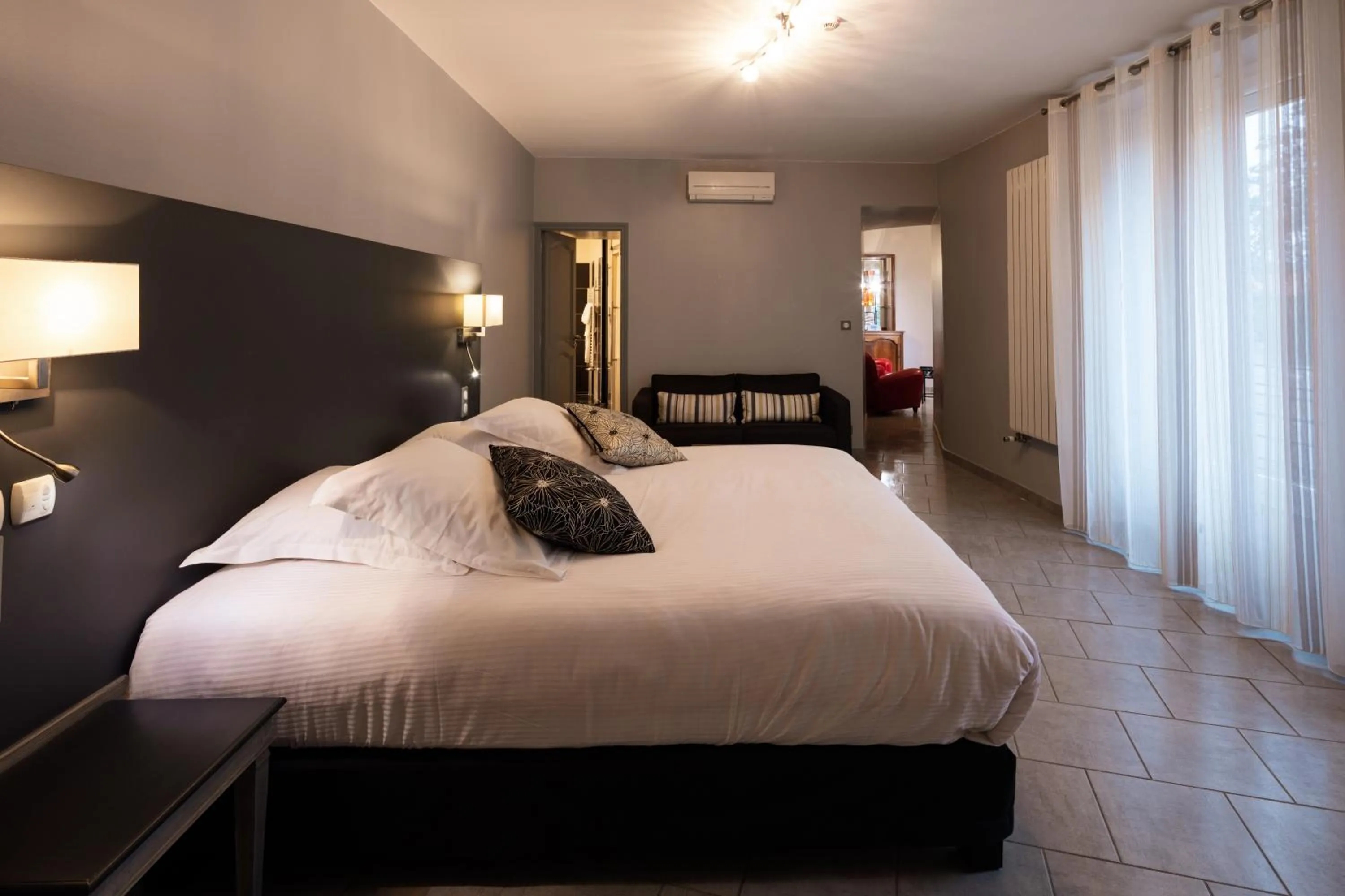 Photo of the whole room, Bed in Logis Hôtel Restaurant de la Paix