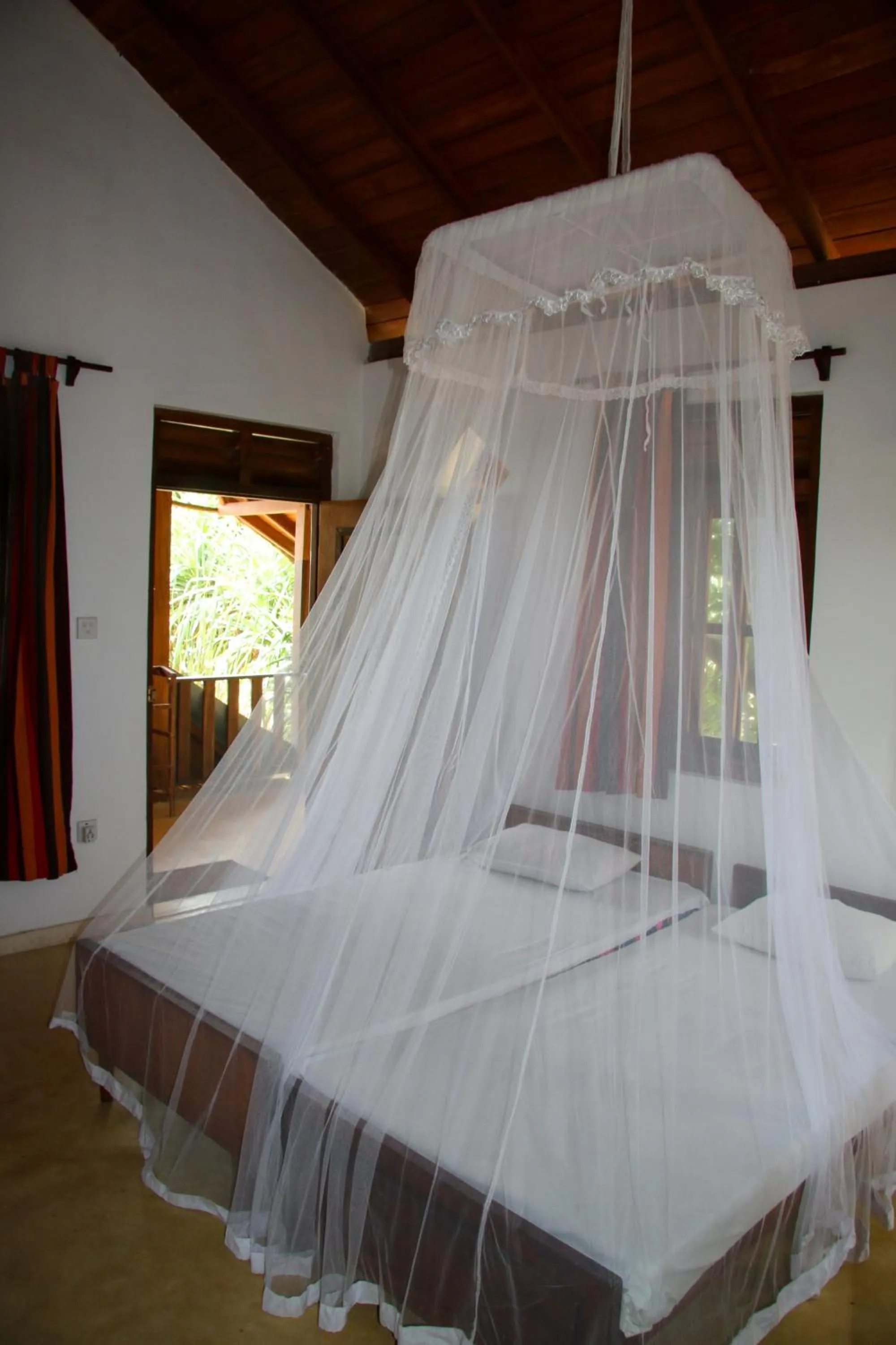 Bed in Shiva's Beach Cabanas