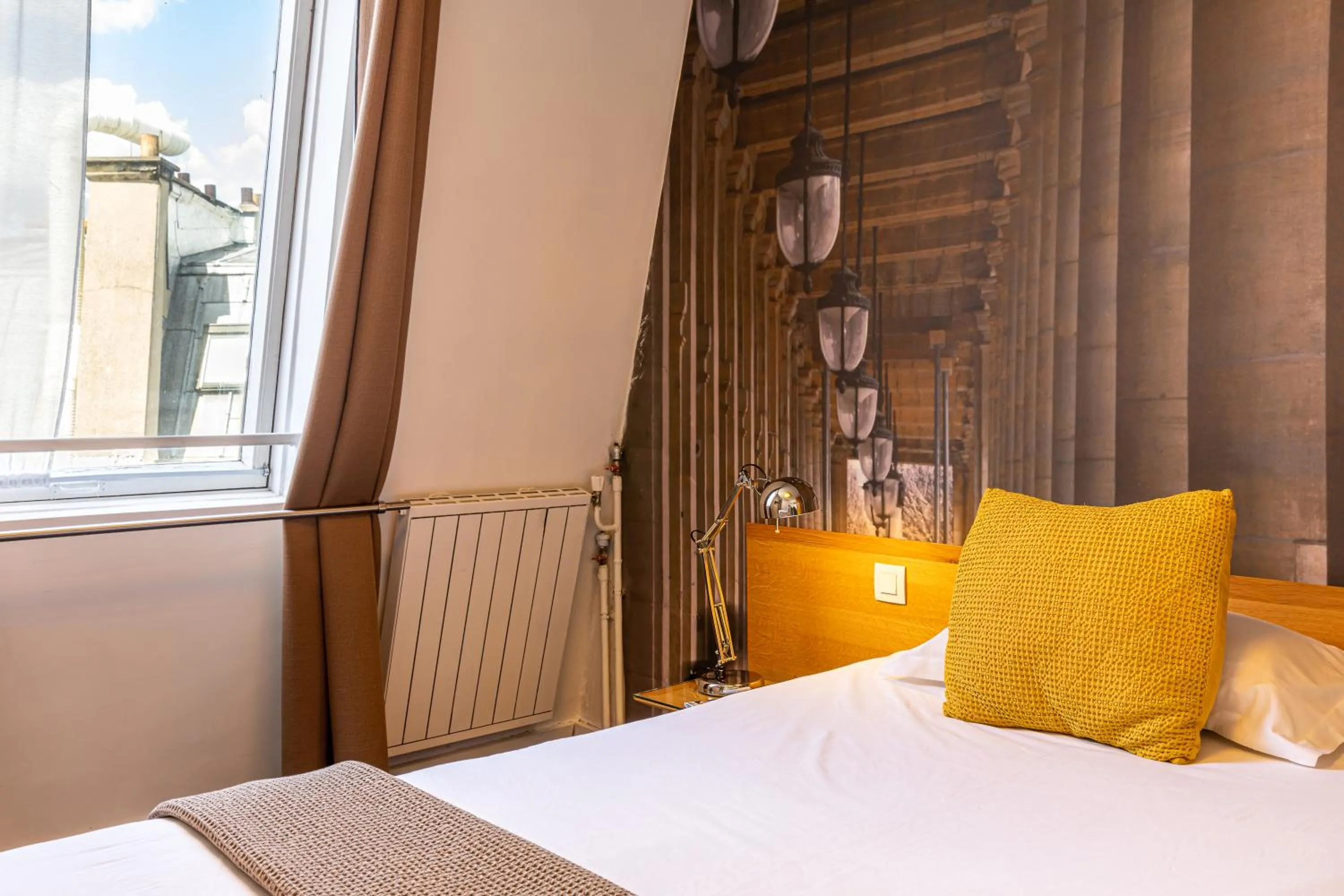 Bed in Le 20 Prieuré Hôtel