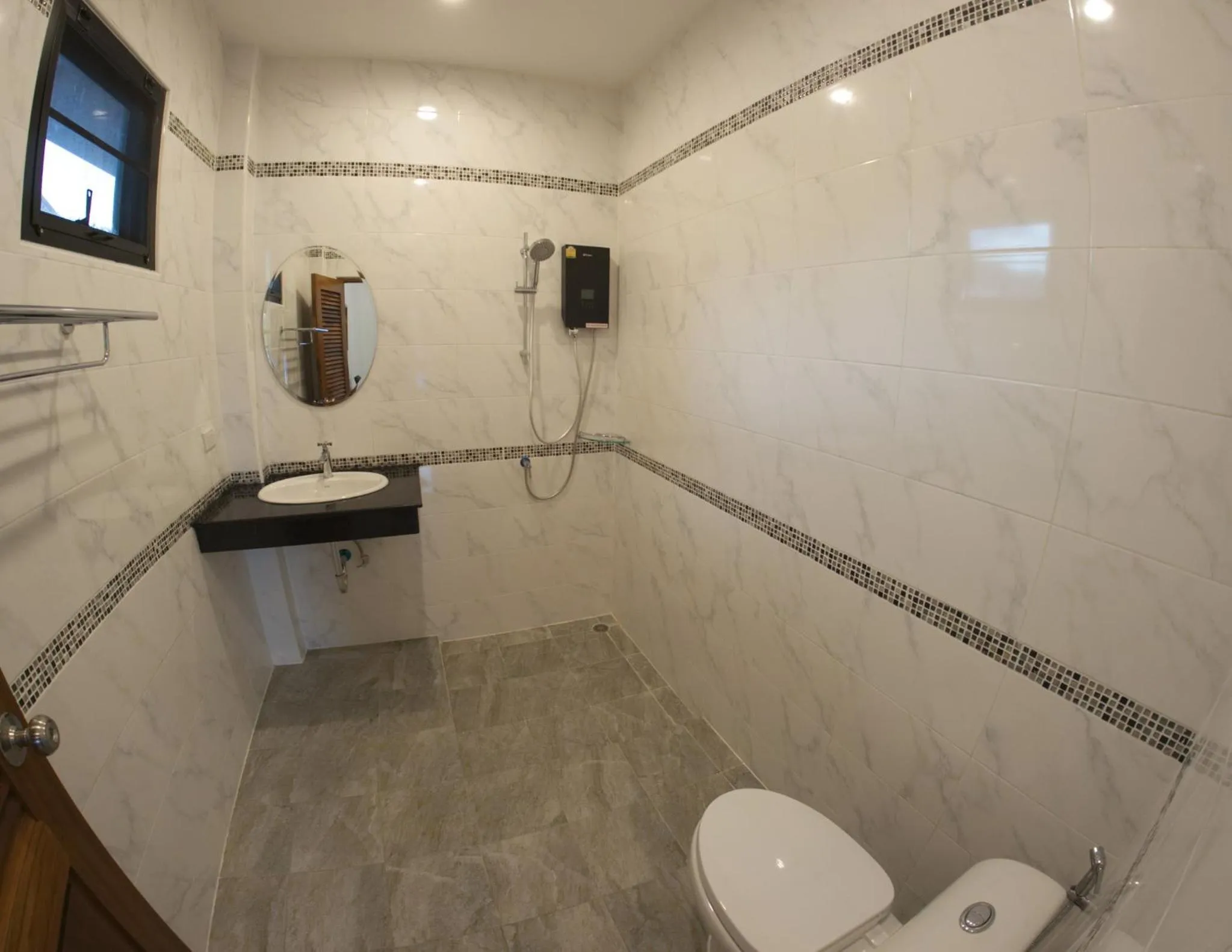 Bathroom in Chanapha Residence