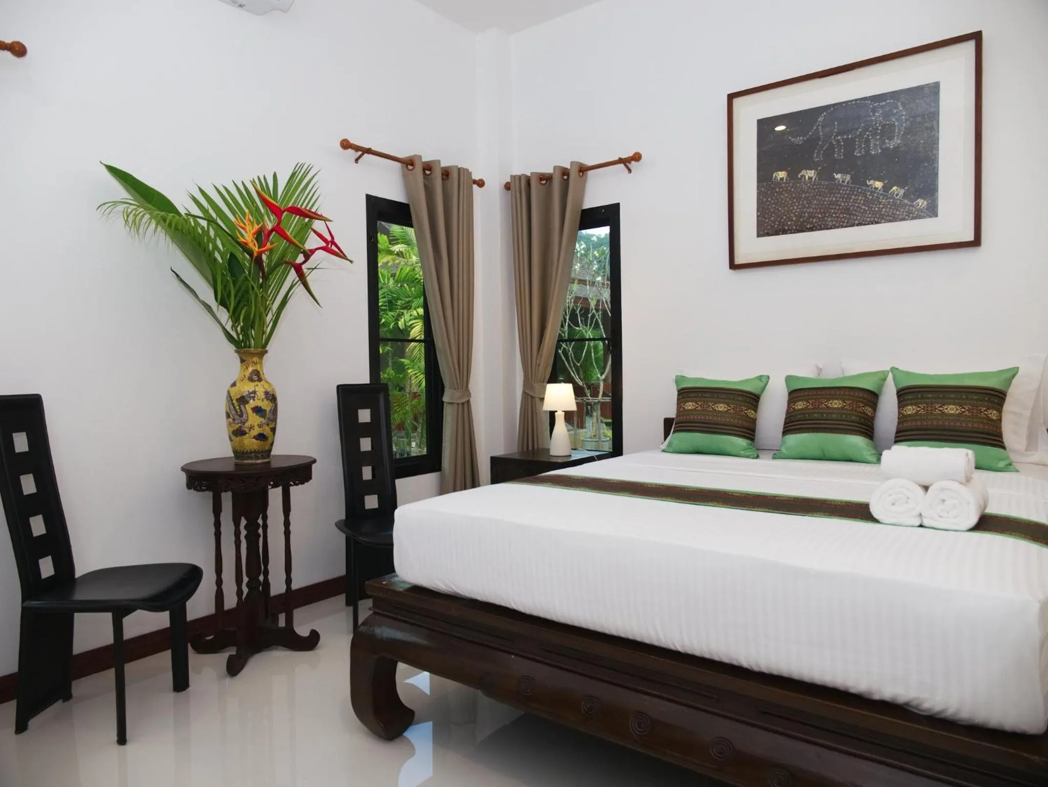 Photo of the whole room, Bed in Chanapha Residence