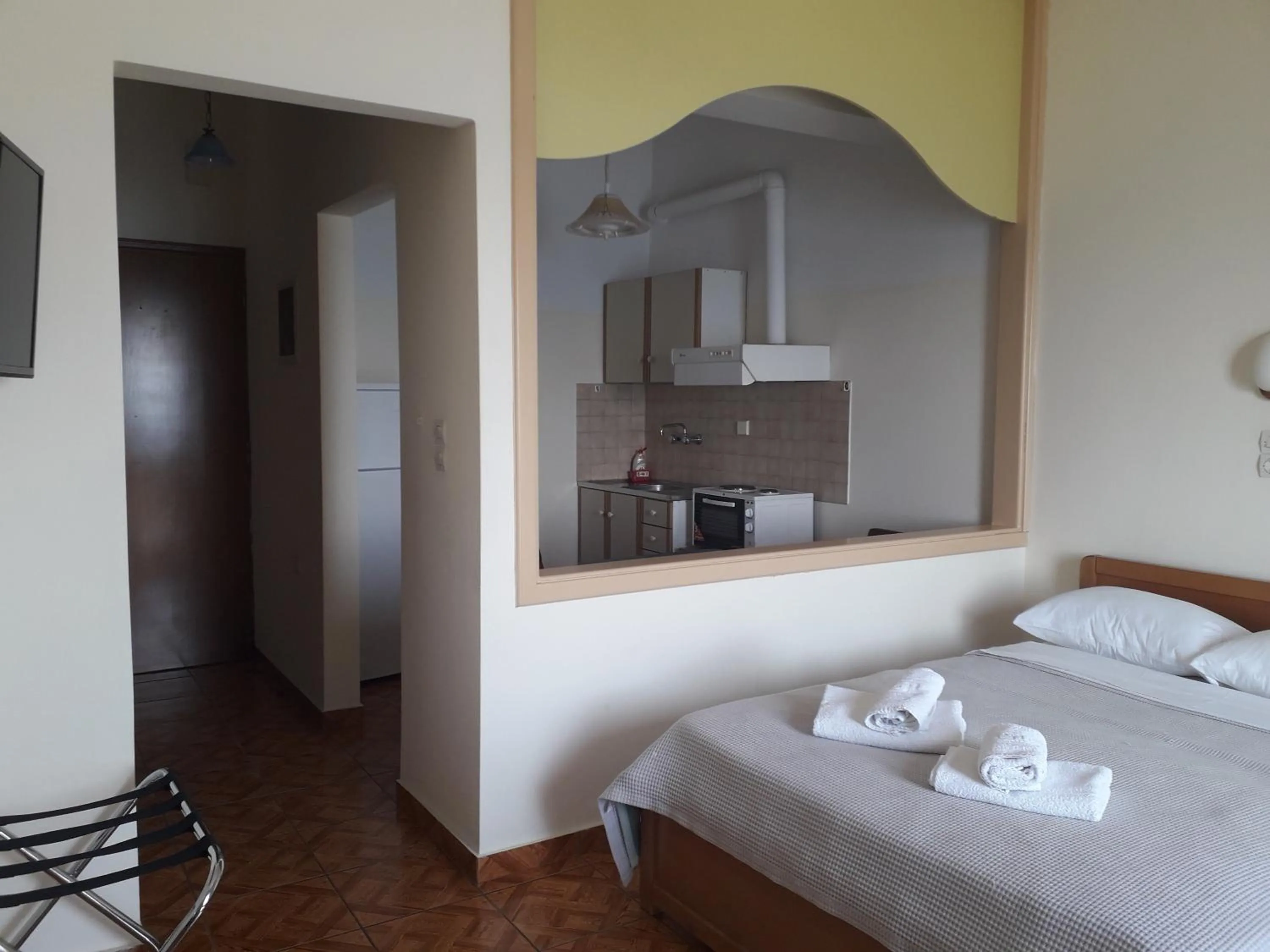 Bed in Poseidon Hotel