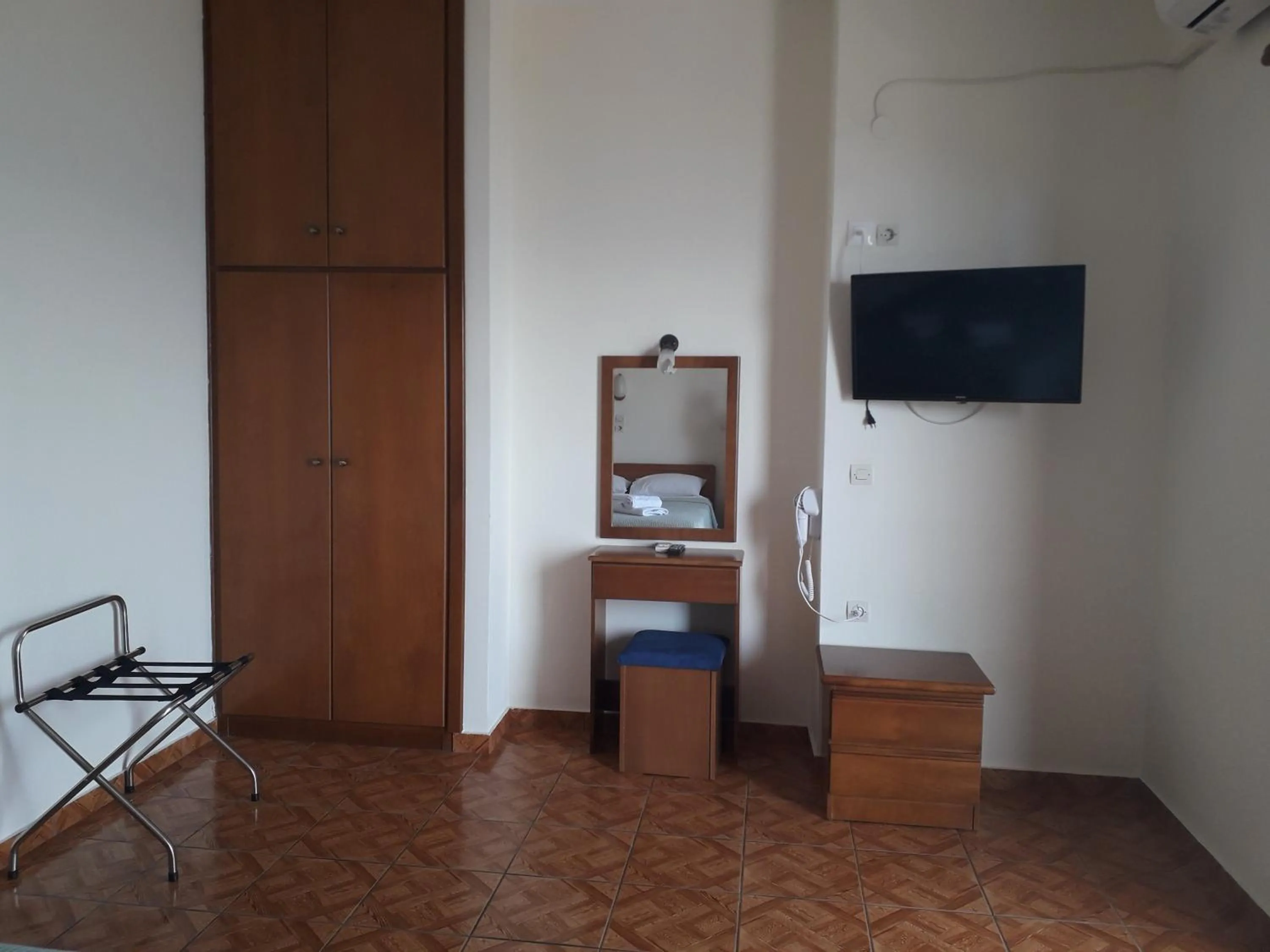 Bedroom in Poseidon Hotel