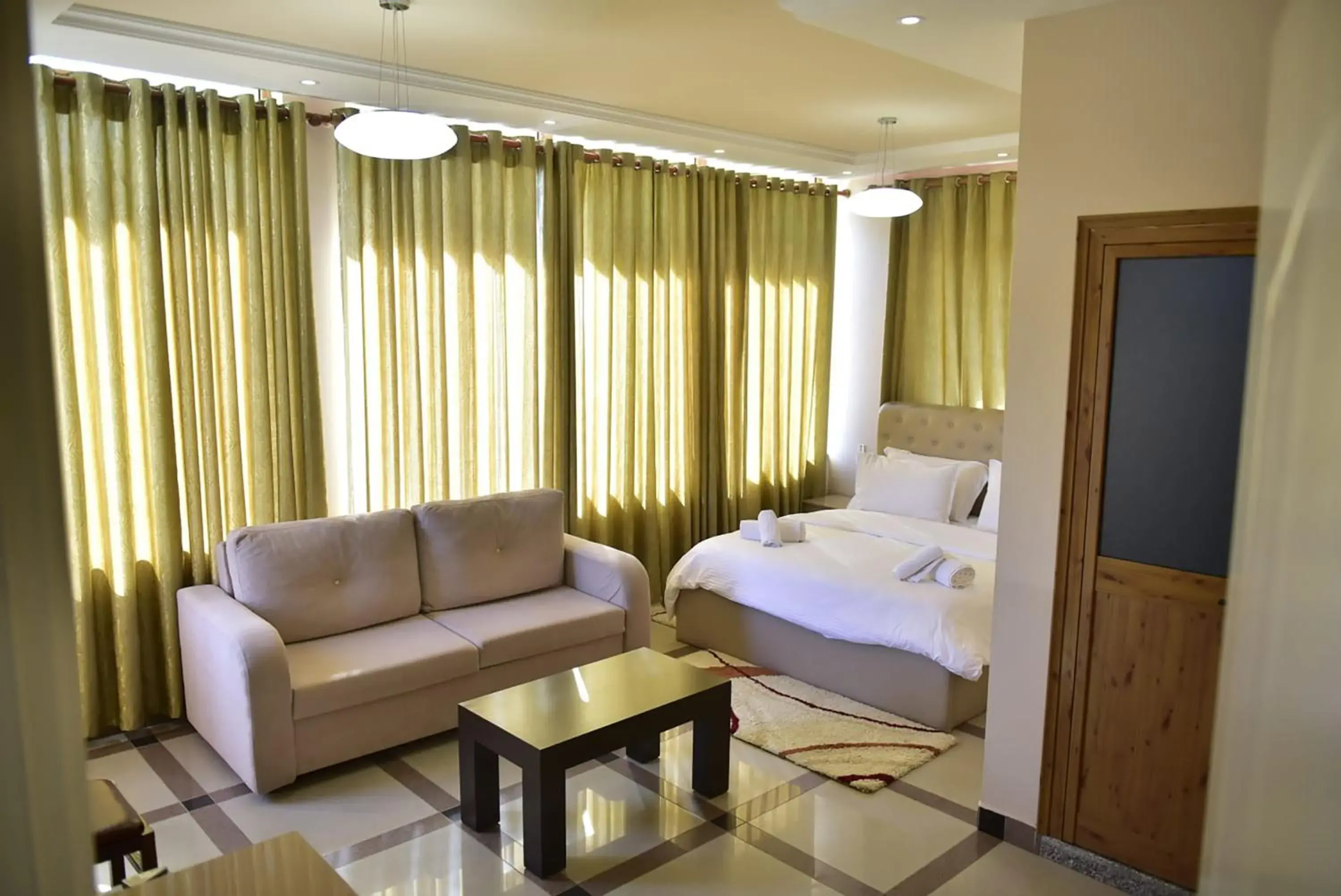 Photo of the whole room, Bed in Buna Park Hotel Photo of the whole room, Bed in Buna Park Hotel