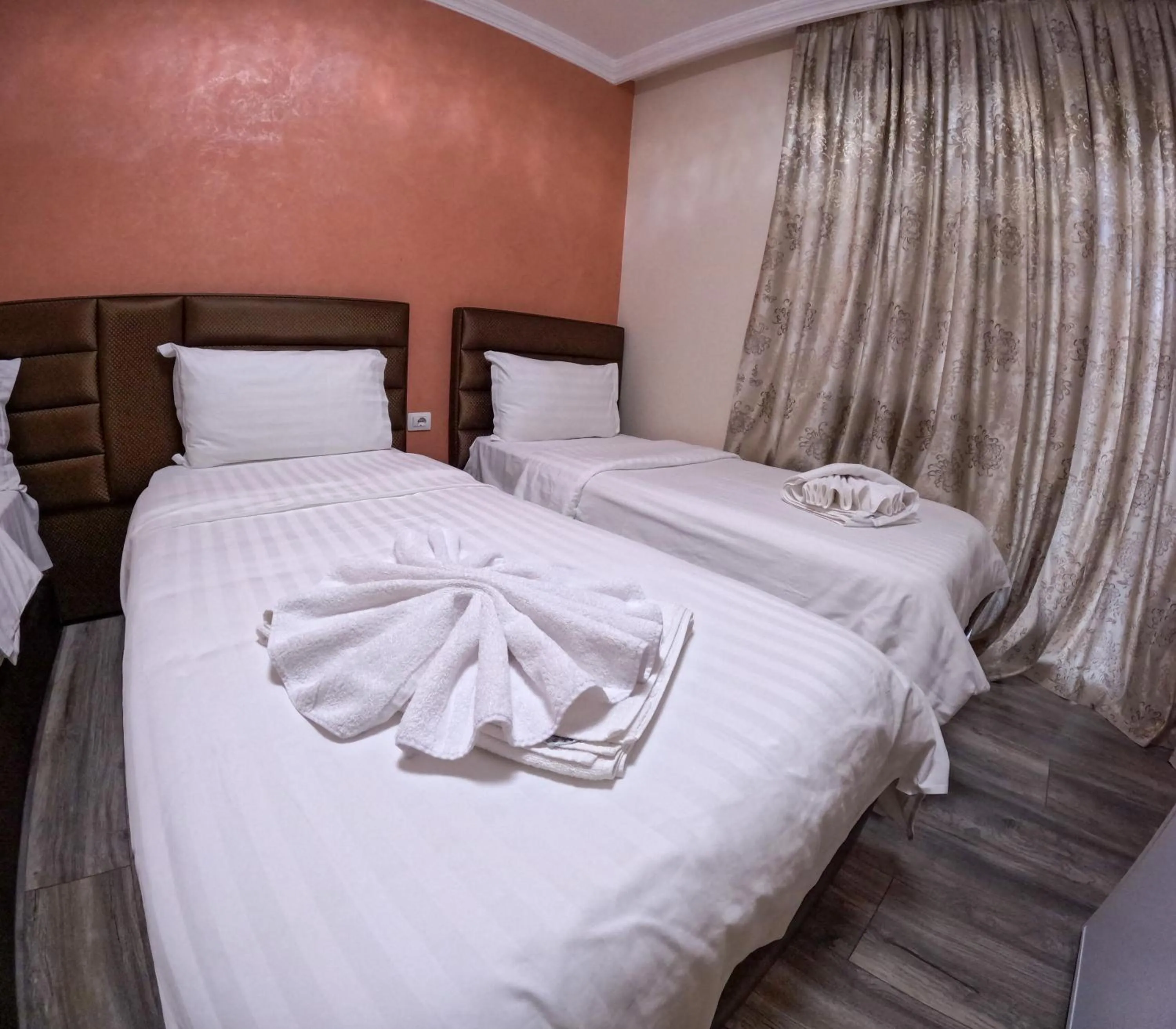 Bed in Buna Park Hotel