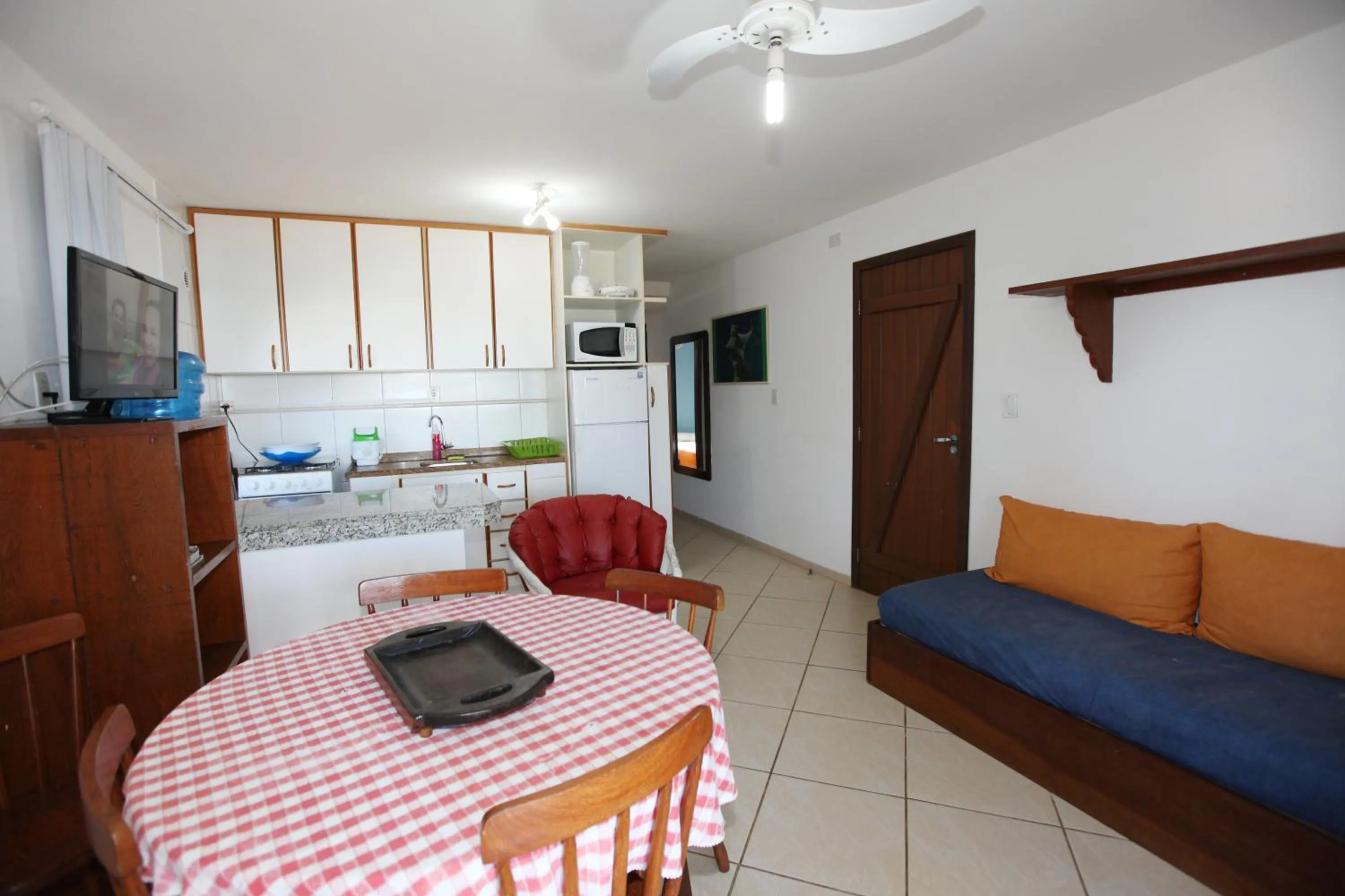 Kitchen or kitchenette in Pousada Hibisco