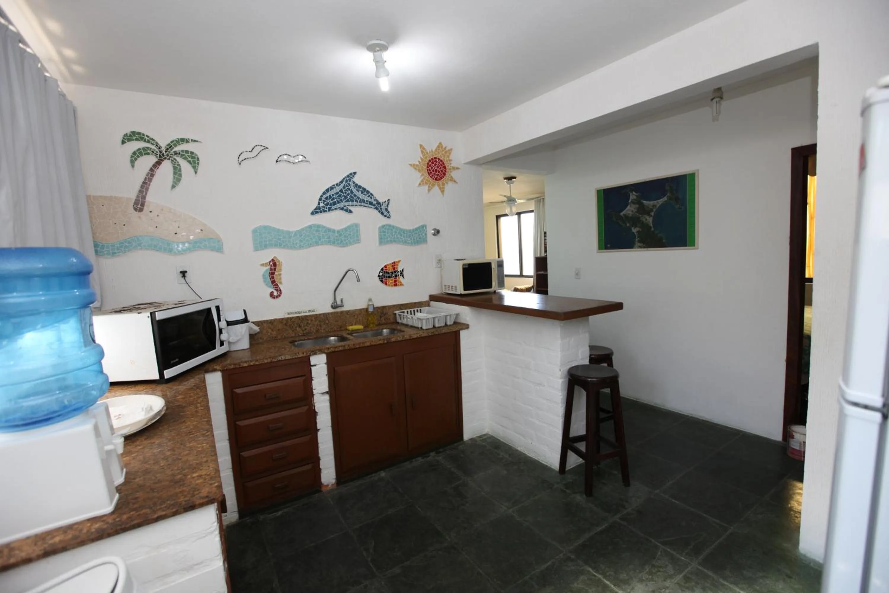 Kitchen or kitchenette in Pousada Hibisco