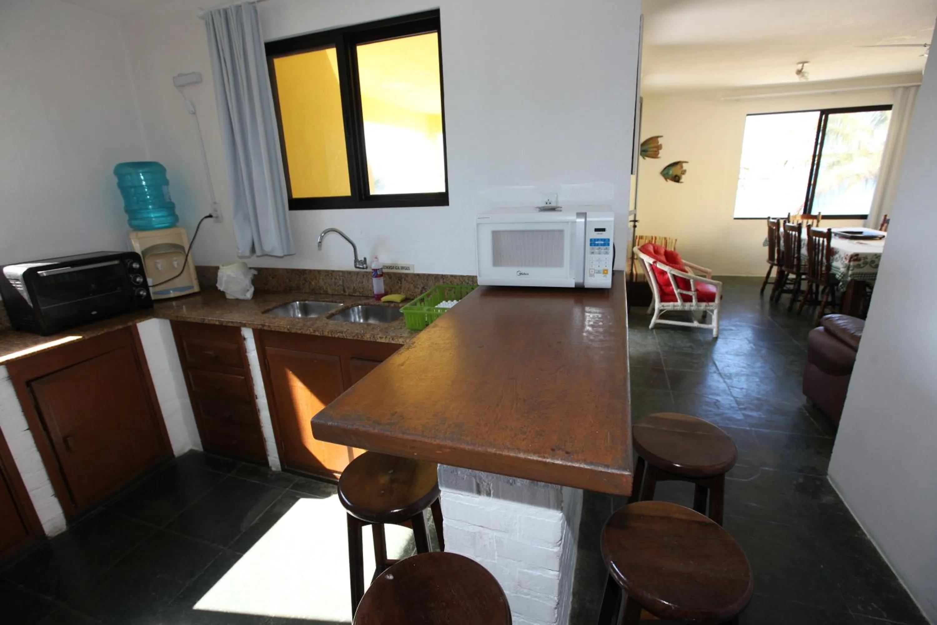 Kitchen or kitchenette in Pousada Hibisco